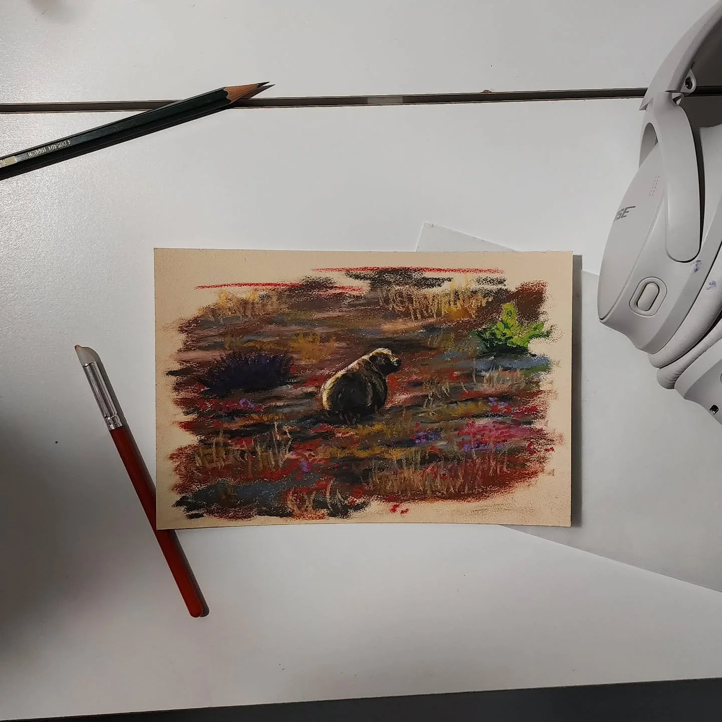 Today's oil pastel study is of a brown bear having a sit in a sea of fall foliage. 

It was my first time seeing a brown bear in the wild. Thankfully, it was on the opposite side of the valley that I was hiking, and my 600mm lens did it's best to cap