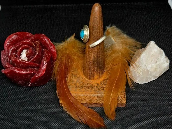 Side view of Adjustable handcrafted sterling silver ring with turquoise stone