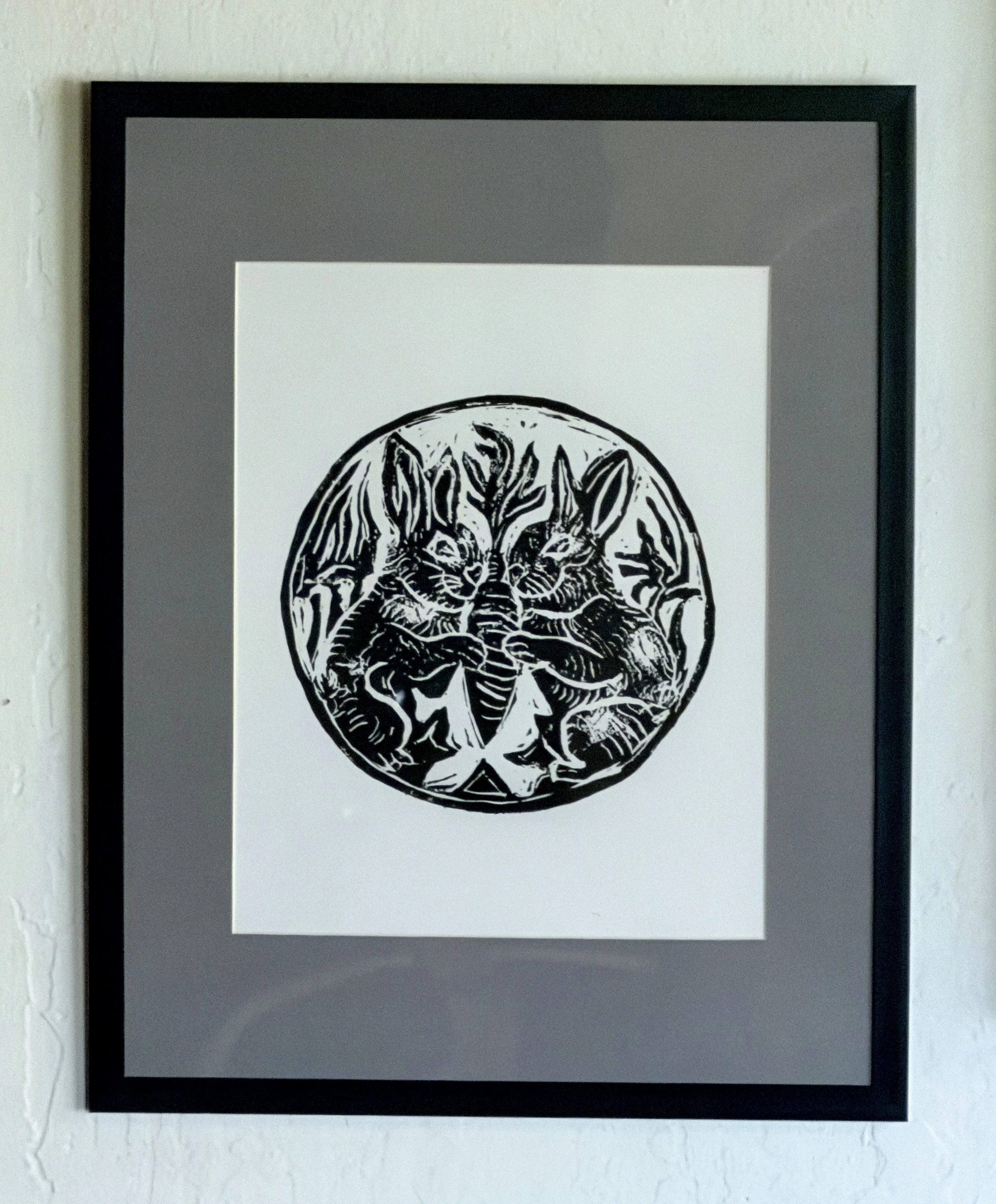 HaveACarrotBunnies.LinocutPrint.GrayMatteFramed.jpg