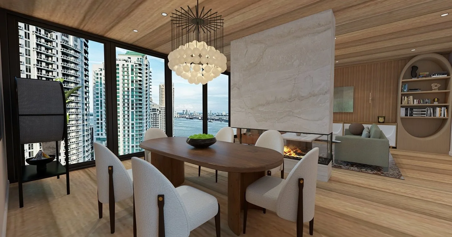 Golden hour reflections meet grounded serenity.
This high-rise retreat was designed to blur the line between city life and sanctuary; where every sunset is framed like art, and every surface hums with quiet texture.

The marble-clad fireplace divides