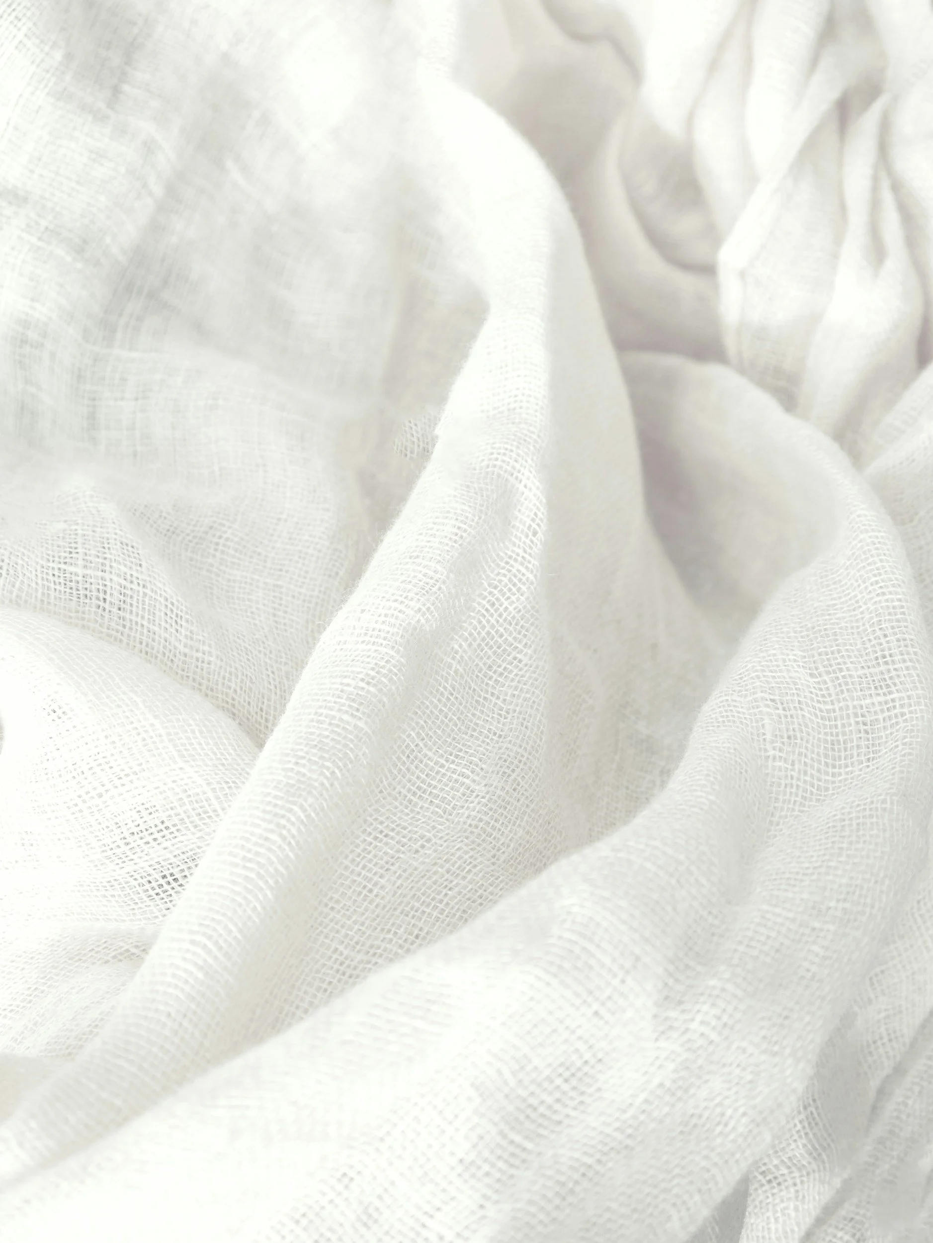 Close-up of soft, white, linen fabric