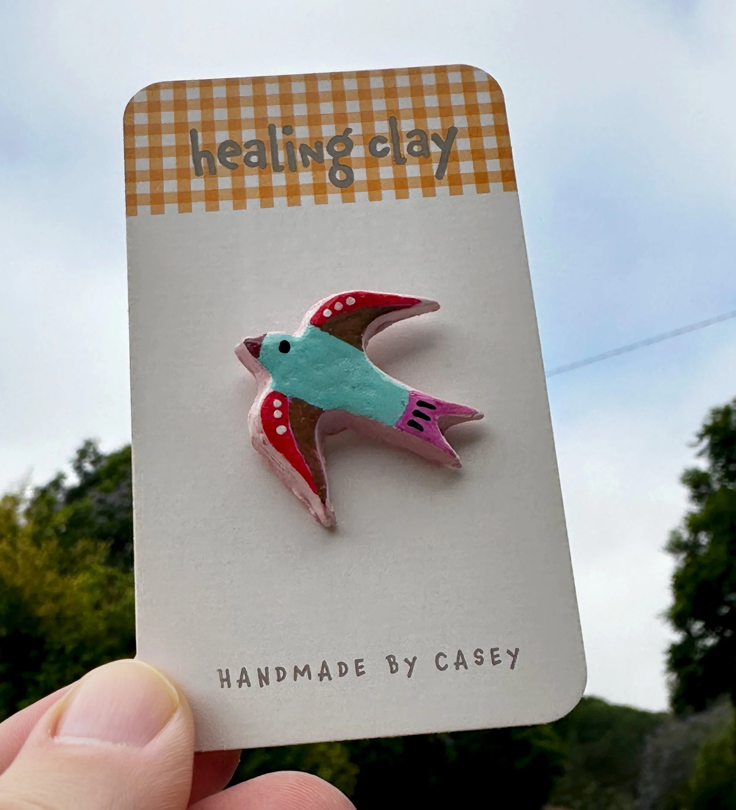 IMG_7079 holding card up.jpg