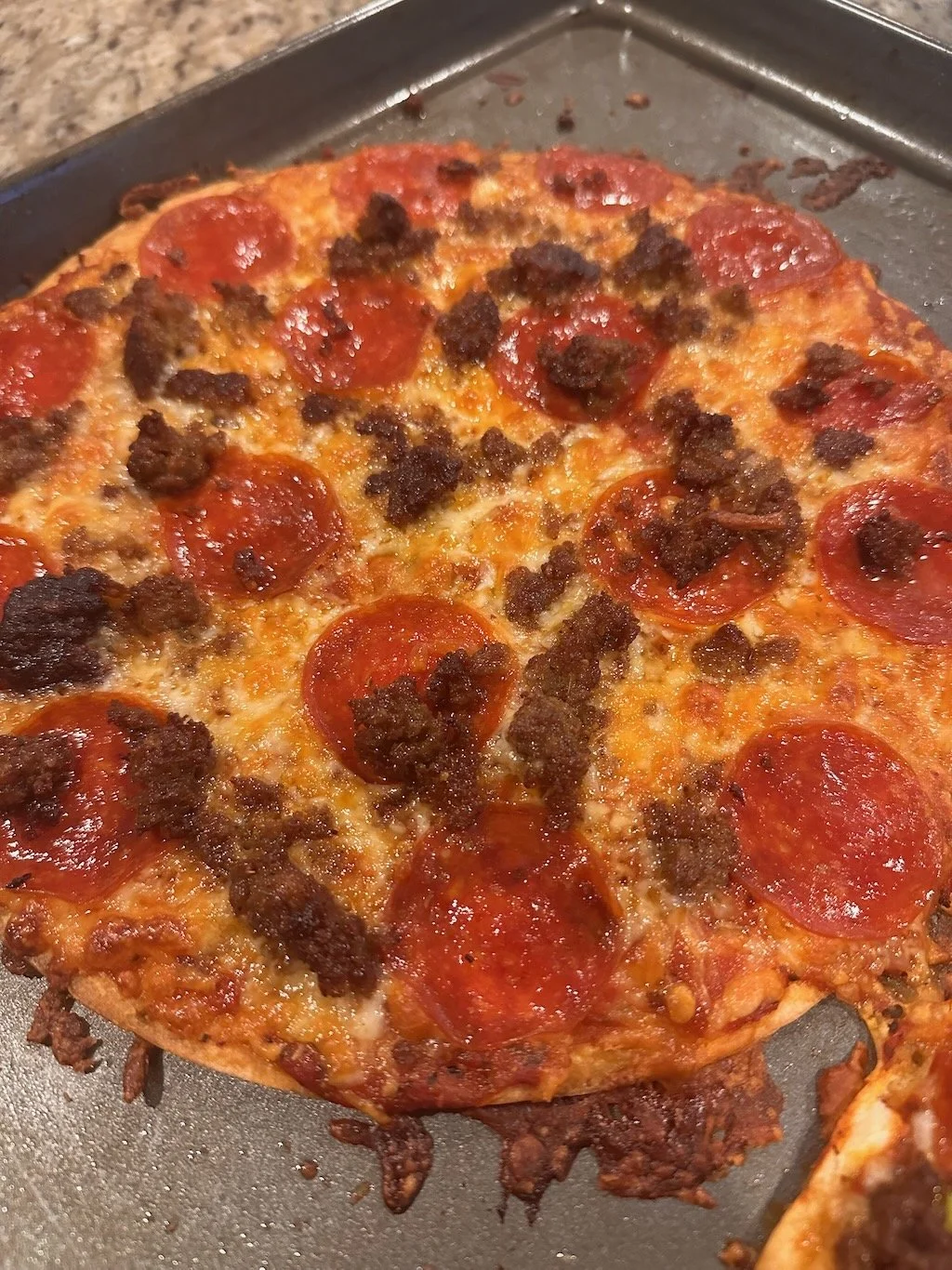 Pepperoni and Hot Sausage Pizza