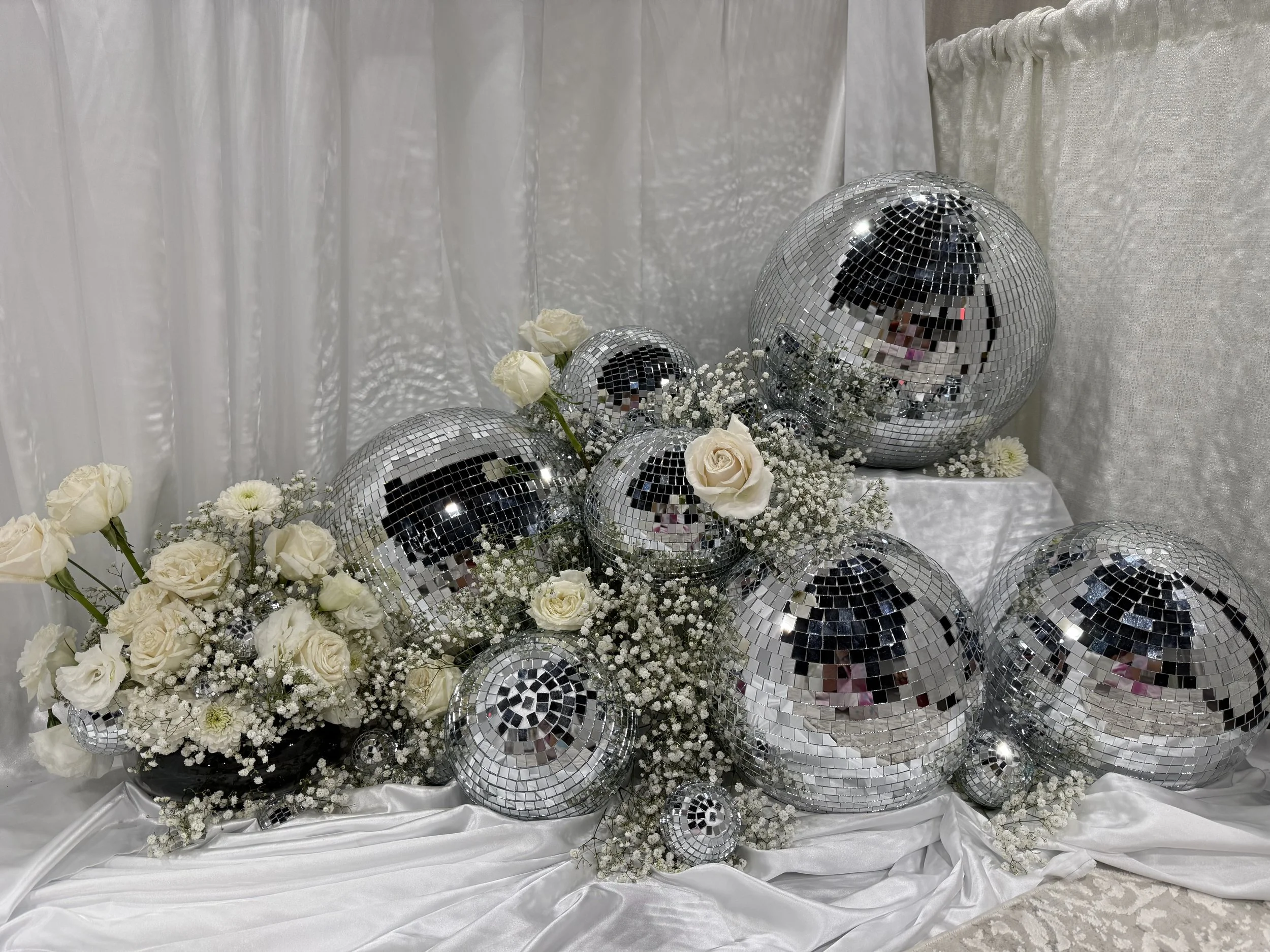Draping, florals, and discoballs for LA Bridal Convention