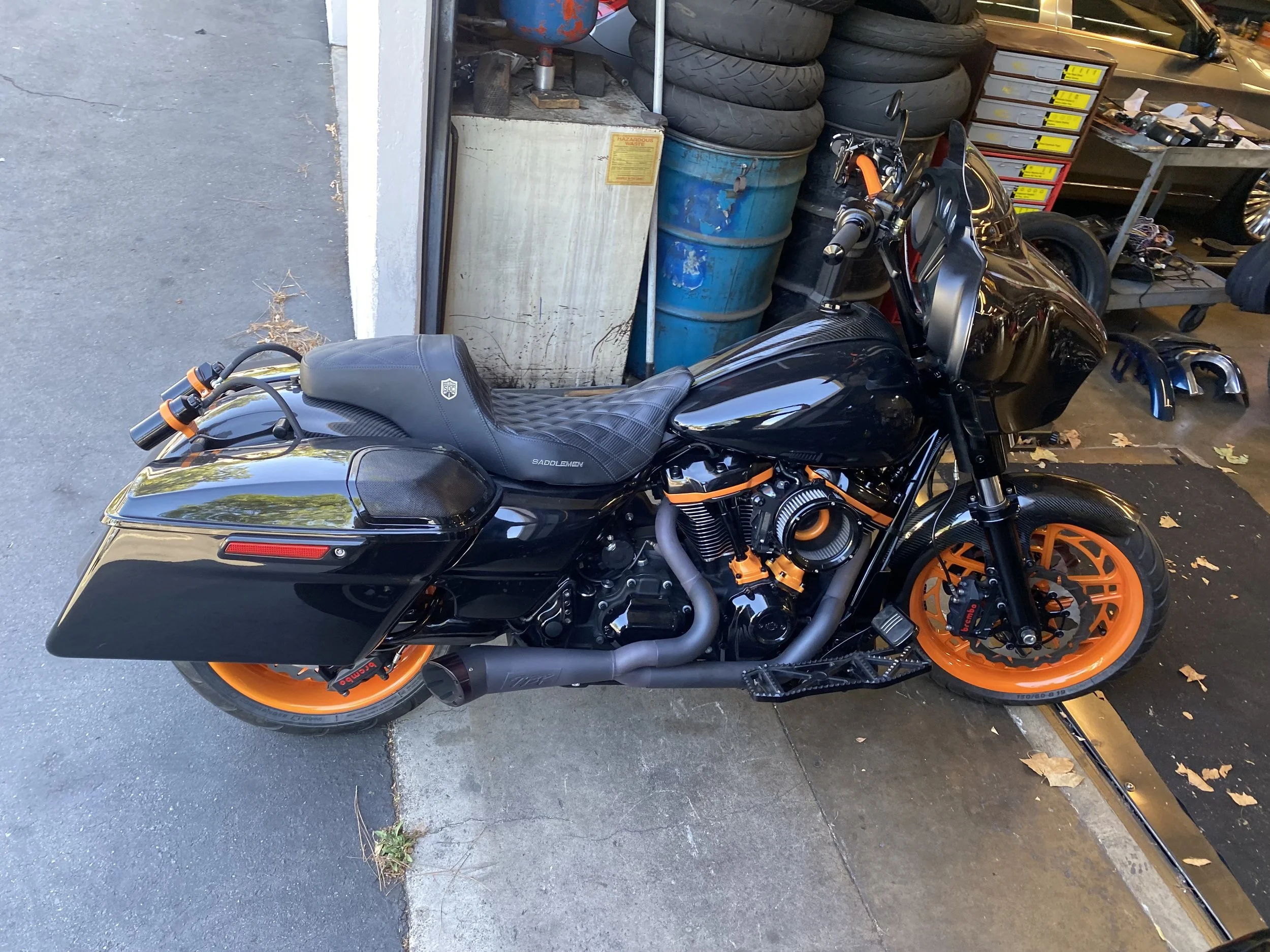 ORANGE WHEELS JAMES CUSTOM BLACK HARLEY SIDE VIEW.jpg