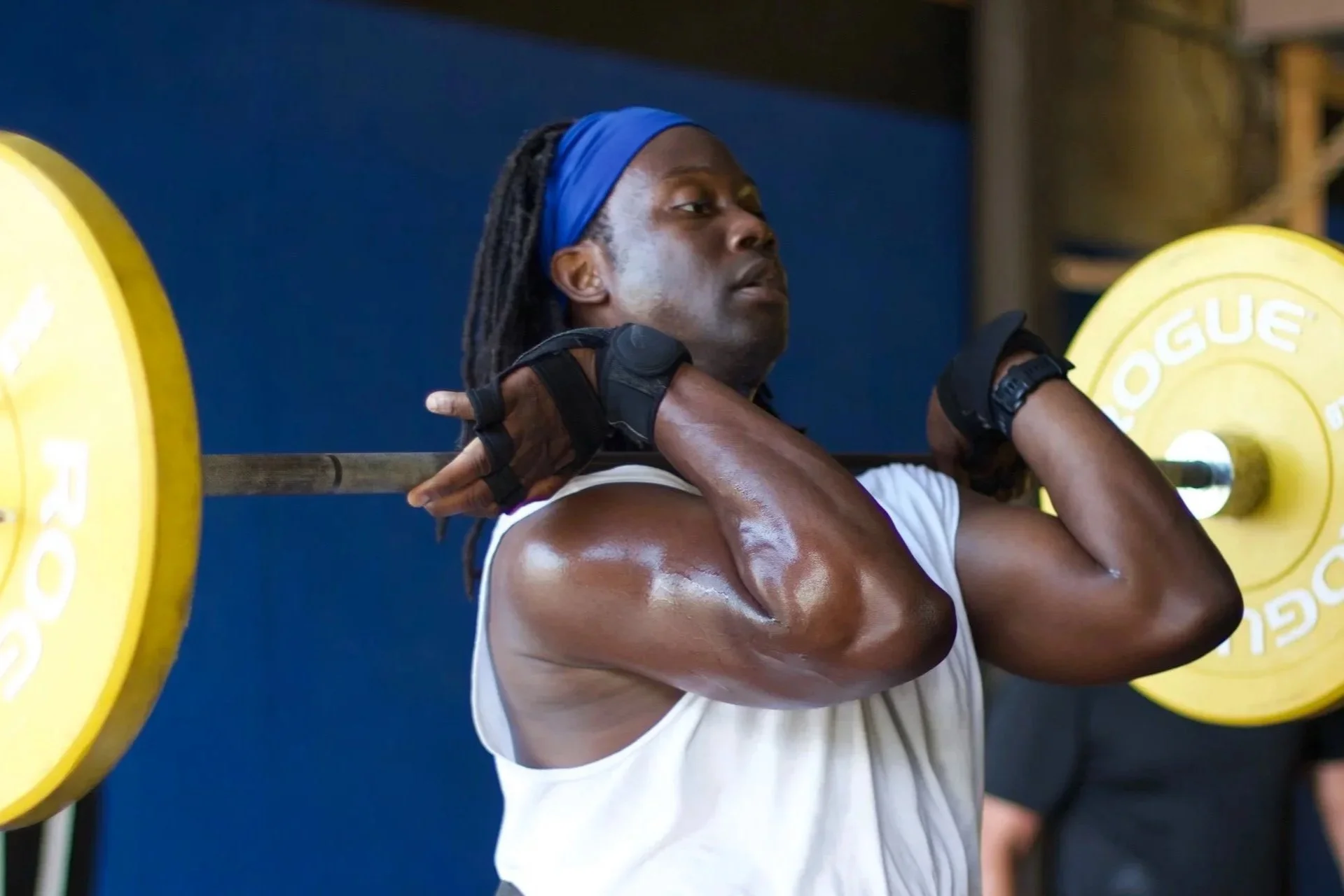 Athlete performing a barbell lift at CrossFit Regulate
