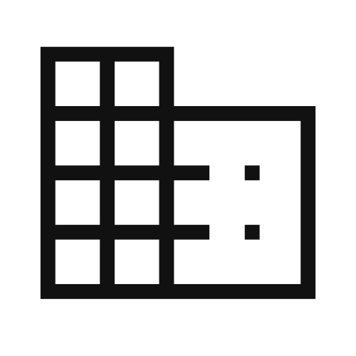 Black and white icon of an office building.