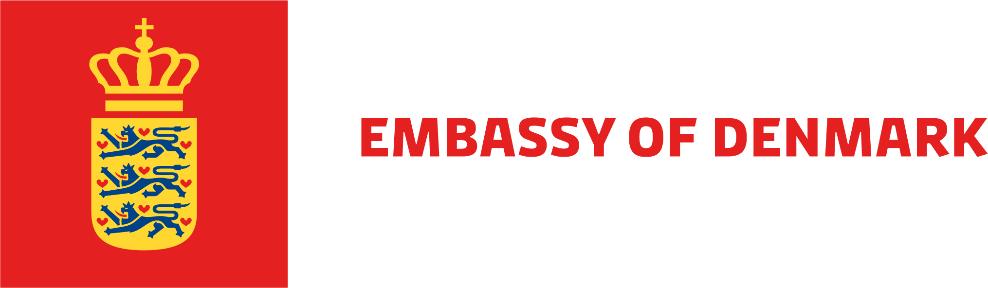 Flag of Denmark with the Danish coat of arms and the text 'Embassy of Denmark' in black and red.