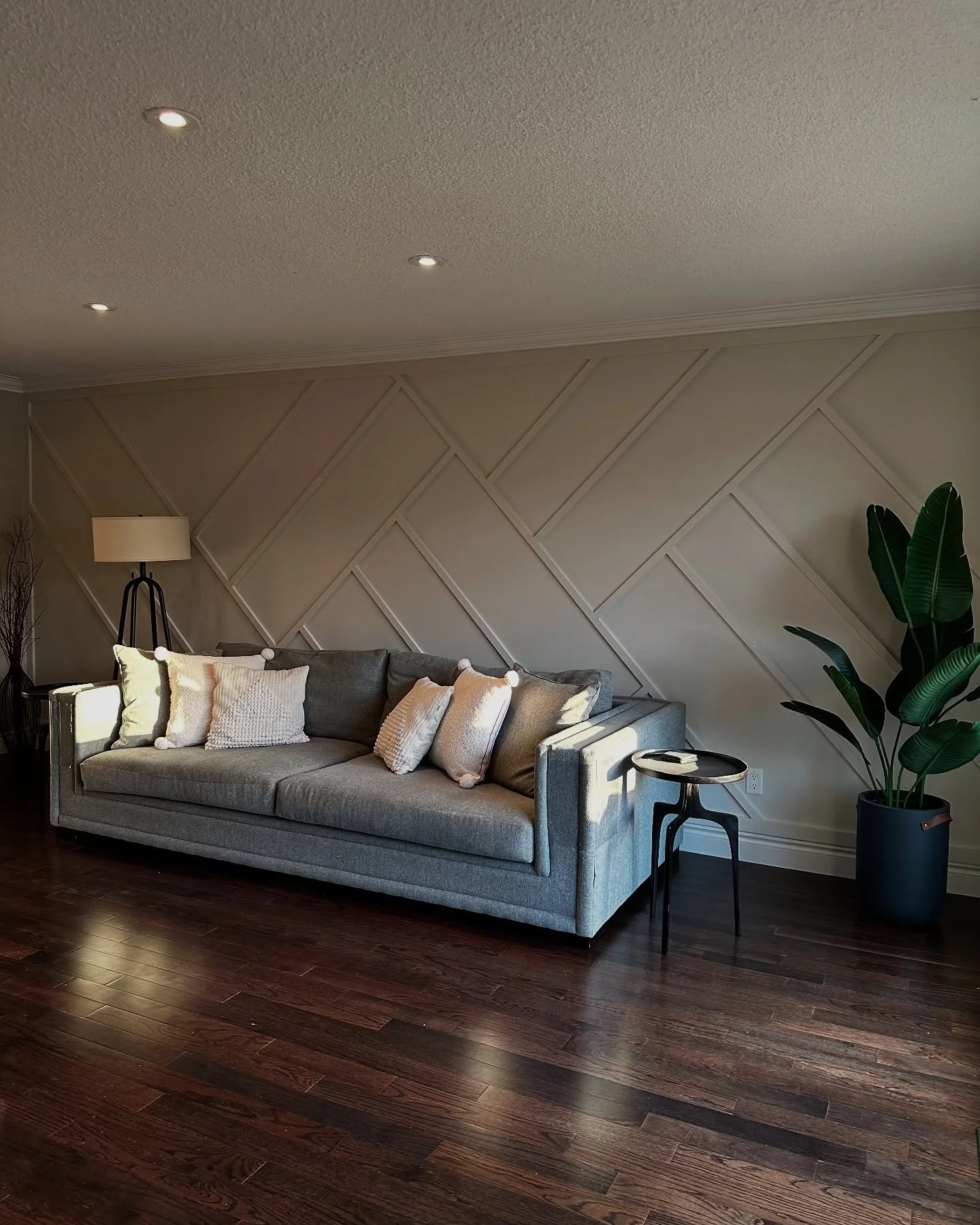 Before ➡️ After
What a difference a feature wall makes! 👌

We transformed this blank wall into a bold accent piece with custom trim work and a modern geometric design. It&rsquo;s clean, classy, and adds a ton of character to the space.

Whether you&
