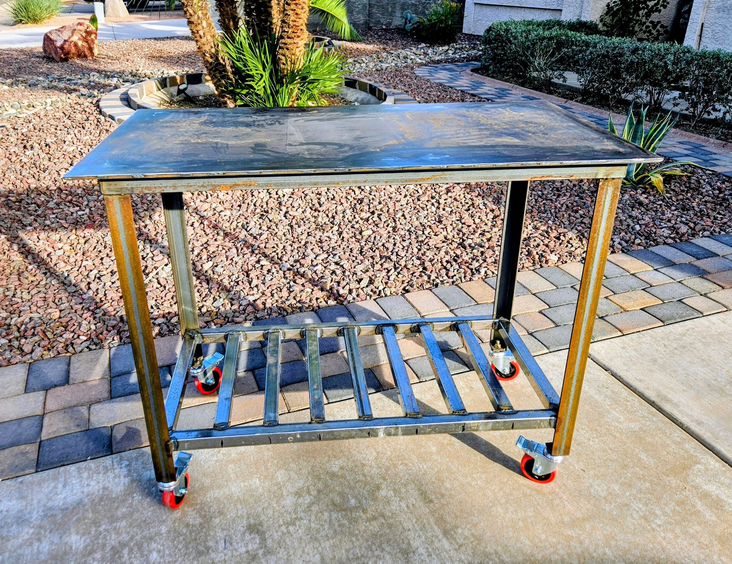 Made this table for smaller welding jobs and tool storage. 