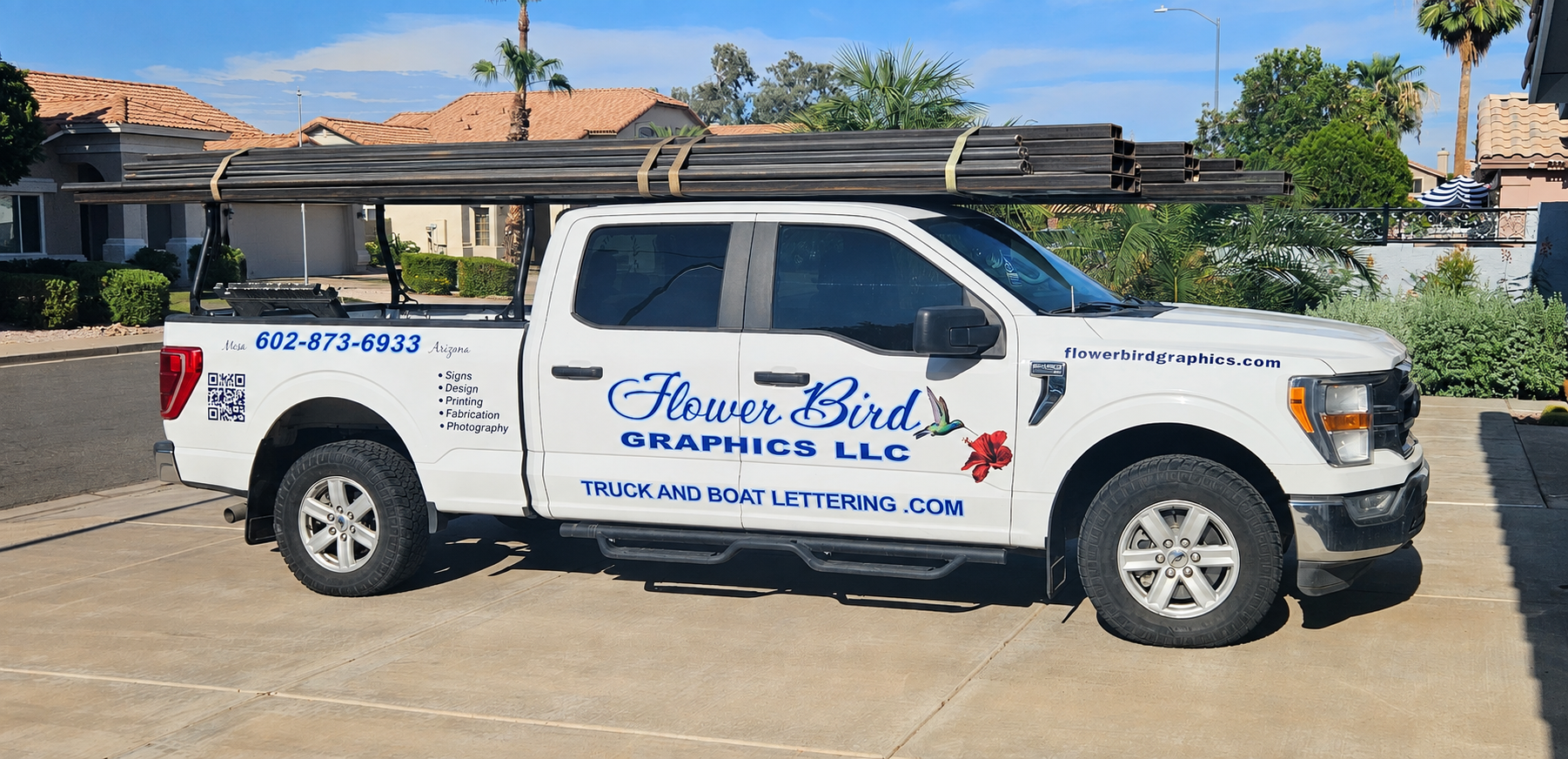 Flower Bird Graphics Service Vehicle loaded with steel