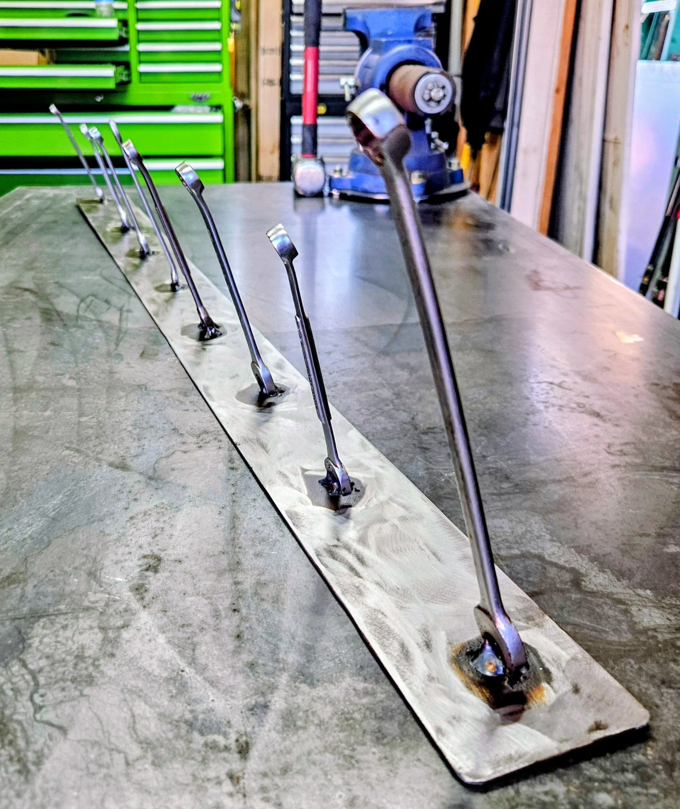 Side View of Rack, Long wrench on end for Saw Blades 