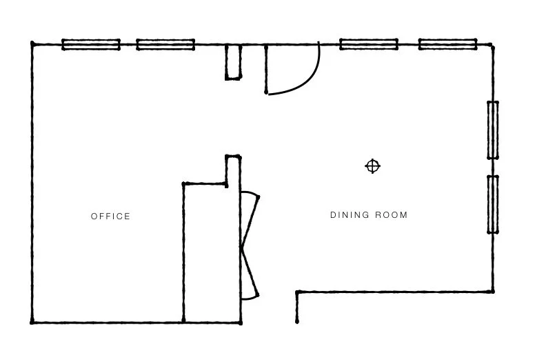 Floor plan of a house with an office on the left and a dining room on the right, connected by a hallway with a door at the top.