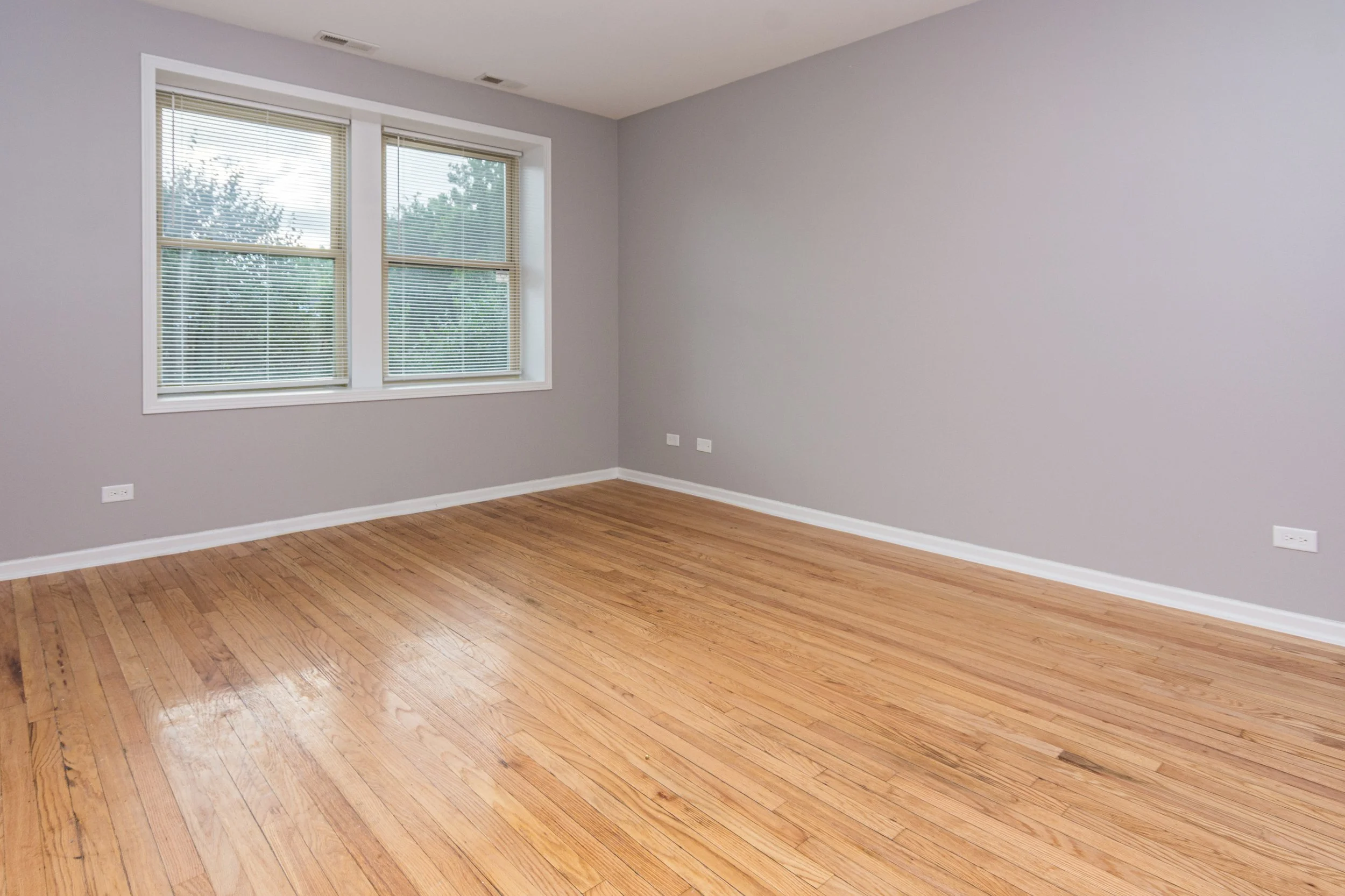 One-bedroom apartment at The Shore Residences with hardwood floors.