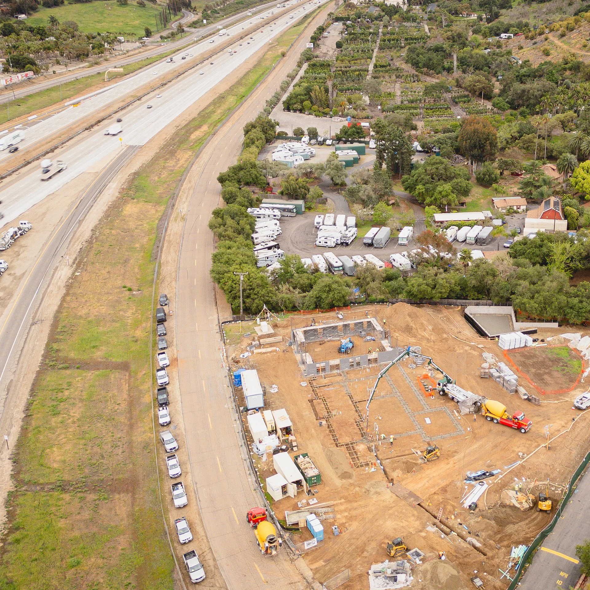 Aerial view of construction site next to highway