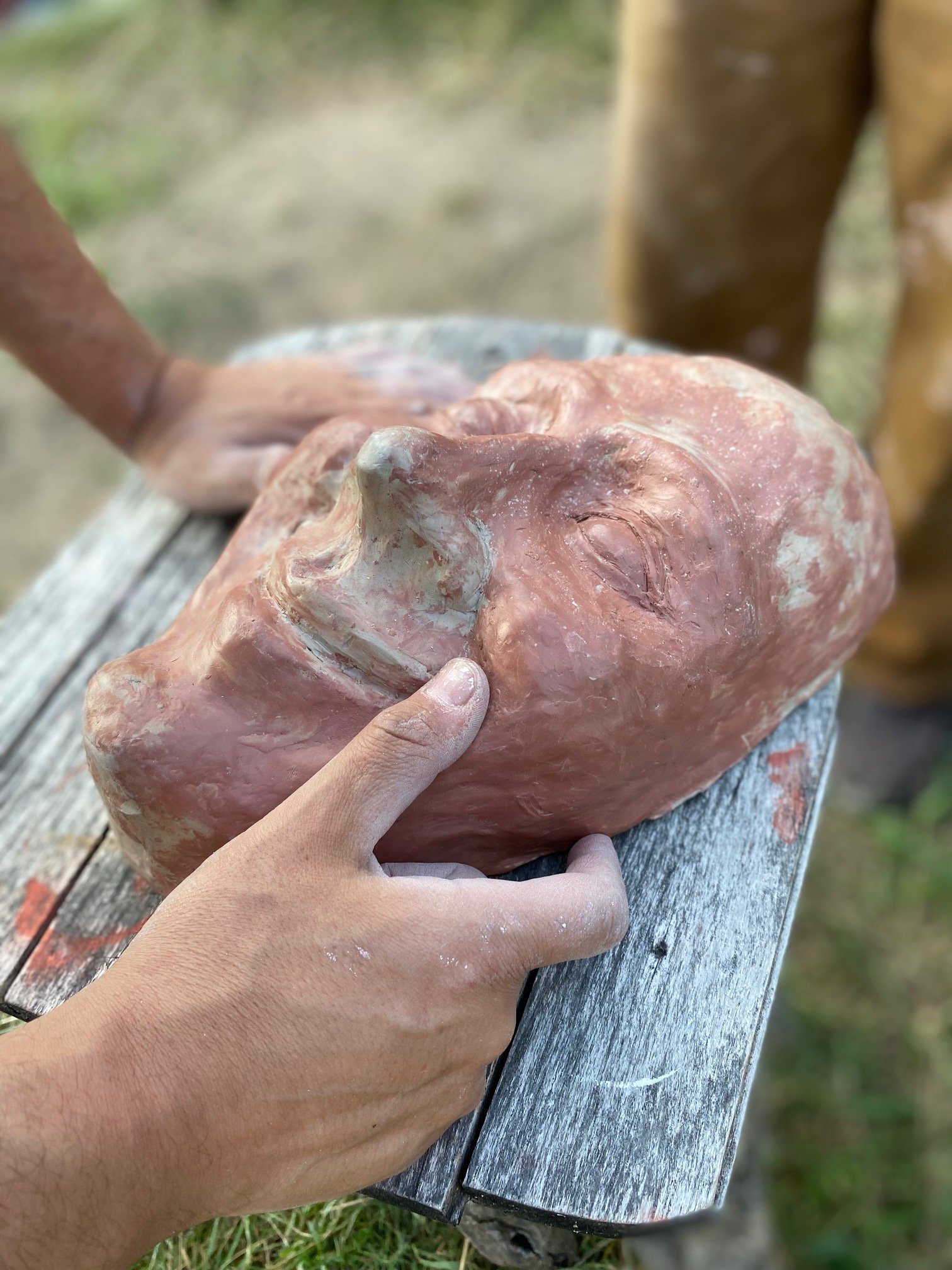 Sometimes pottery doesn't need to have a point. Here we see a face in progress that will end up on a tree somewhere.