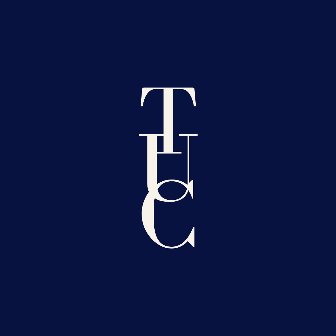 The Uptown Collective logo: navy blue background with letters TUC layered vertically