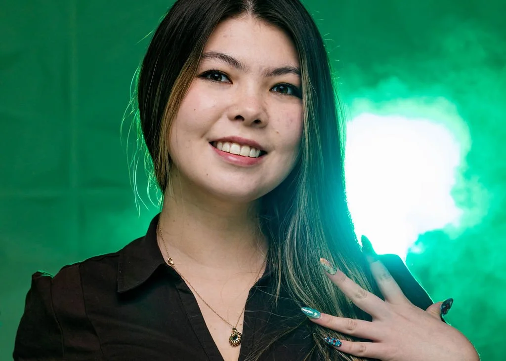 Headshot of Eri with a soft smile