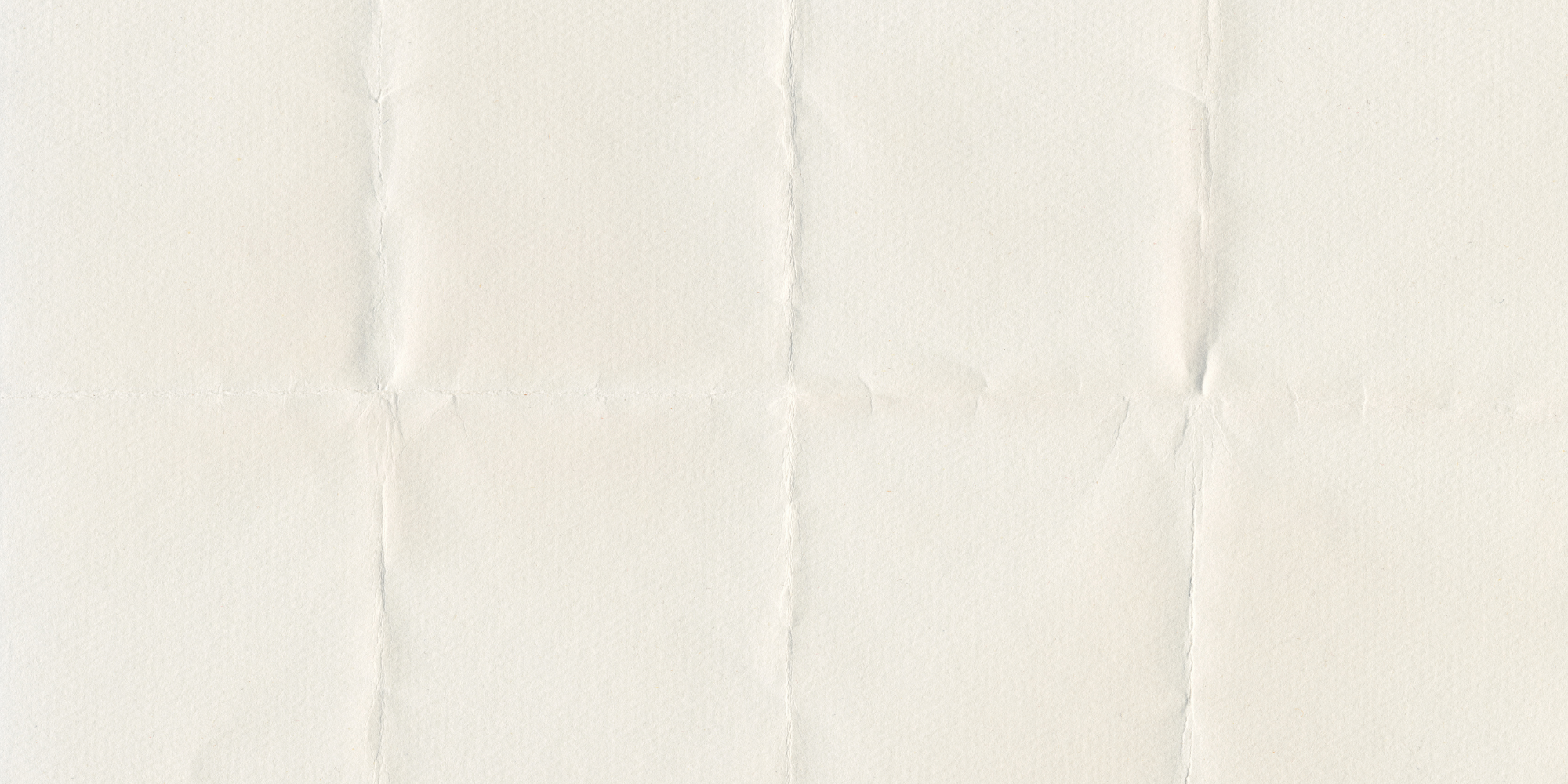 A blank, crumpled sheet of off-white paper with visible creases and texture.