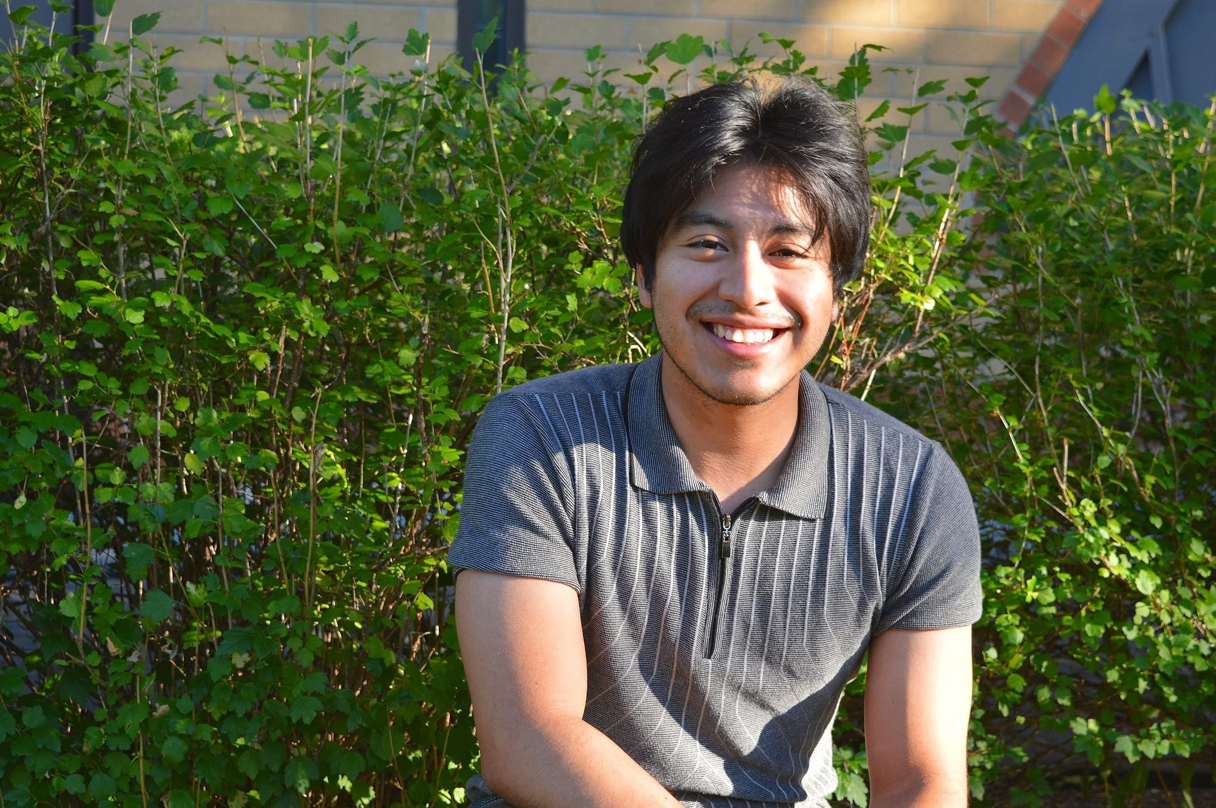 Sam, musical co-director, acoustic guitar, cajon, vocals