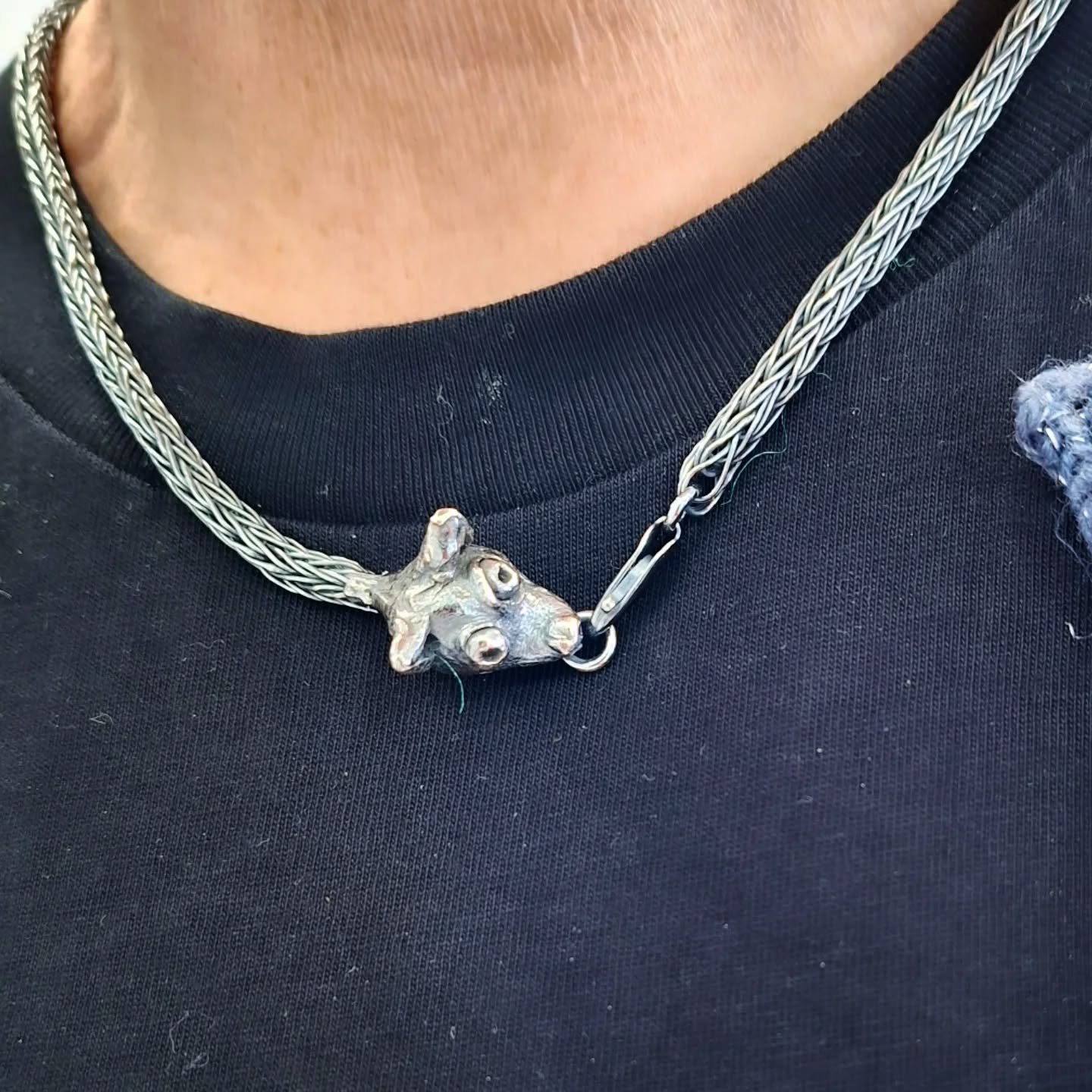 This little character I made about a decade ago came back in to the workshop for a bit of a tune up. (He needed a firmer more secure catch.) 
I was delighted to discover this piece is now being worn by the original owner's (now pretty much grown up) 