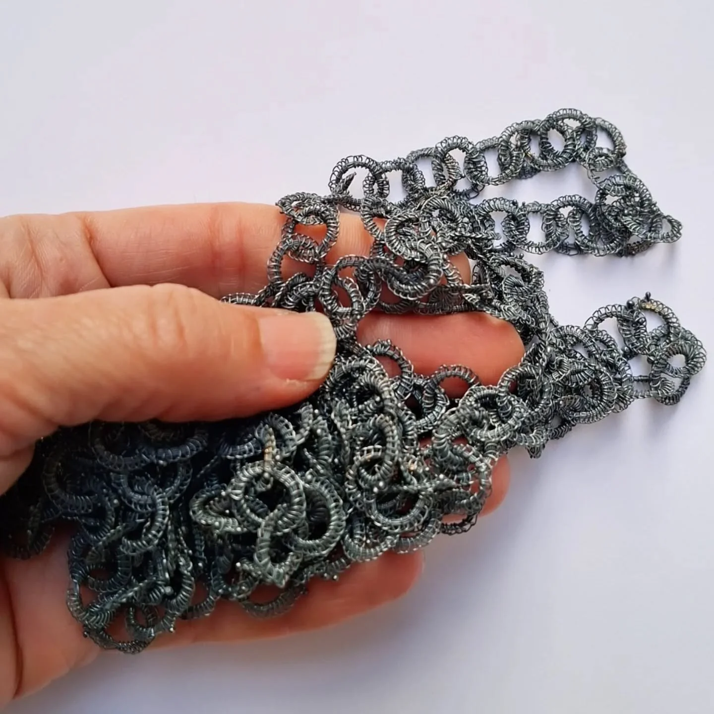 Whakamaumahara. 
Oxidised sterling silver.
2026

I made this, and another companion piece, as a commemorative work.
One of the reference points I looked at were Victorian horse hair mourning chains.
(Horse hair is surprisingly springy and tough as a 