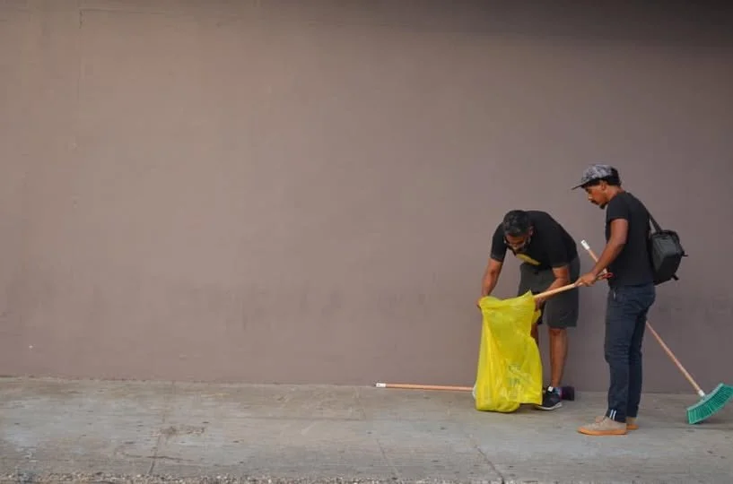Luis Vasquez LaRoche, Nikolai Mahesh Noel gathering material for space cookie mountain on Luis Street, Woodbrook, Port of Spain. Click image to visit SYoS facbook page.  