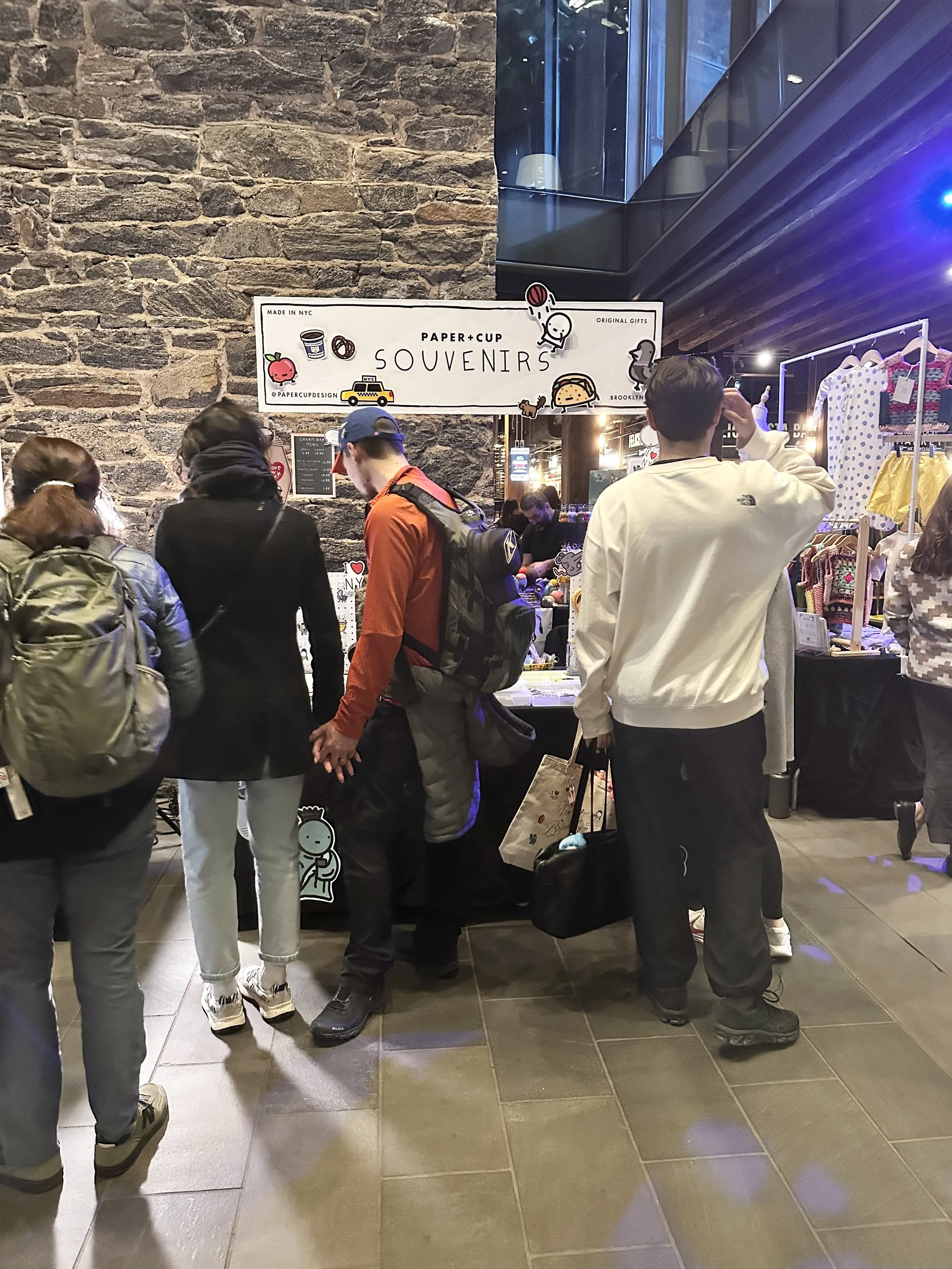 06-RealWorld-Fad-TimeOut-Popup-customers-at-booth-2026-age16.JPG