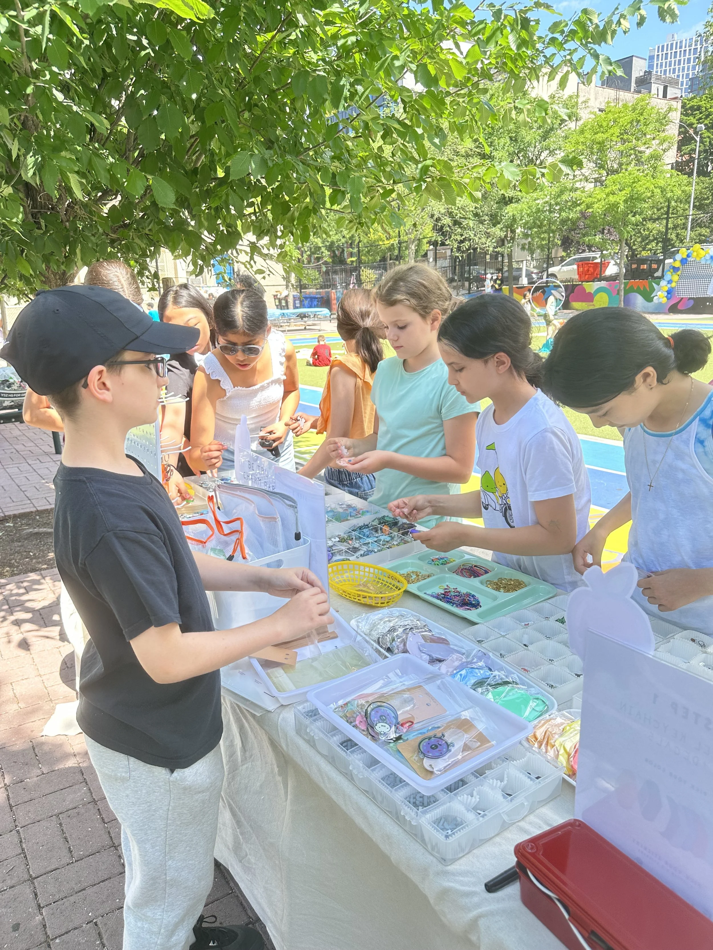 PS38-9-truman-helping-kids-charm-table.jpeg