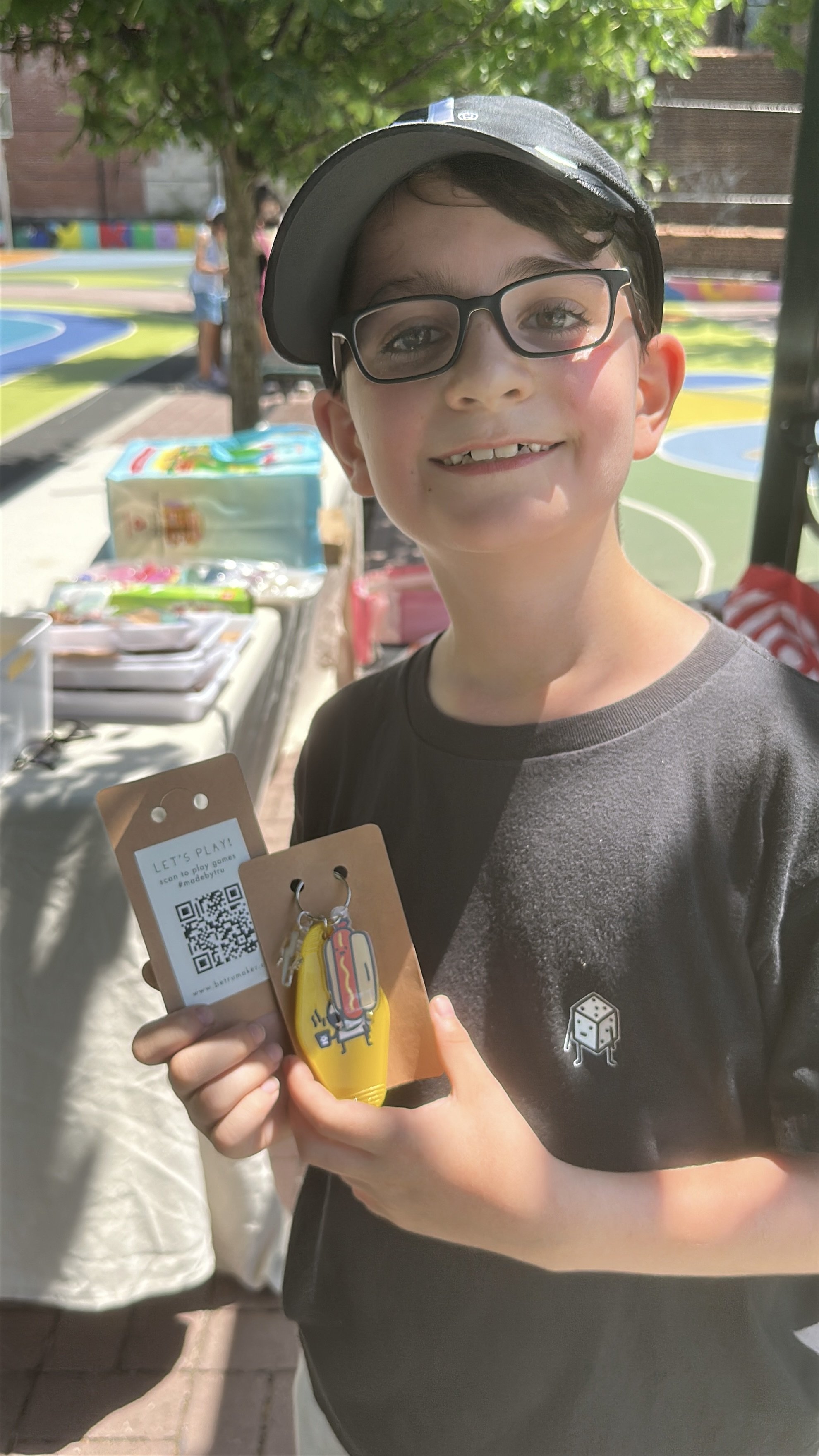 PS38-35-boy-glasses-cap-holding-hotdog-motel-keychain.jpg