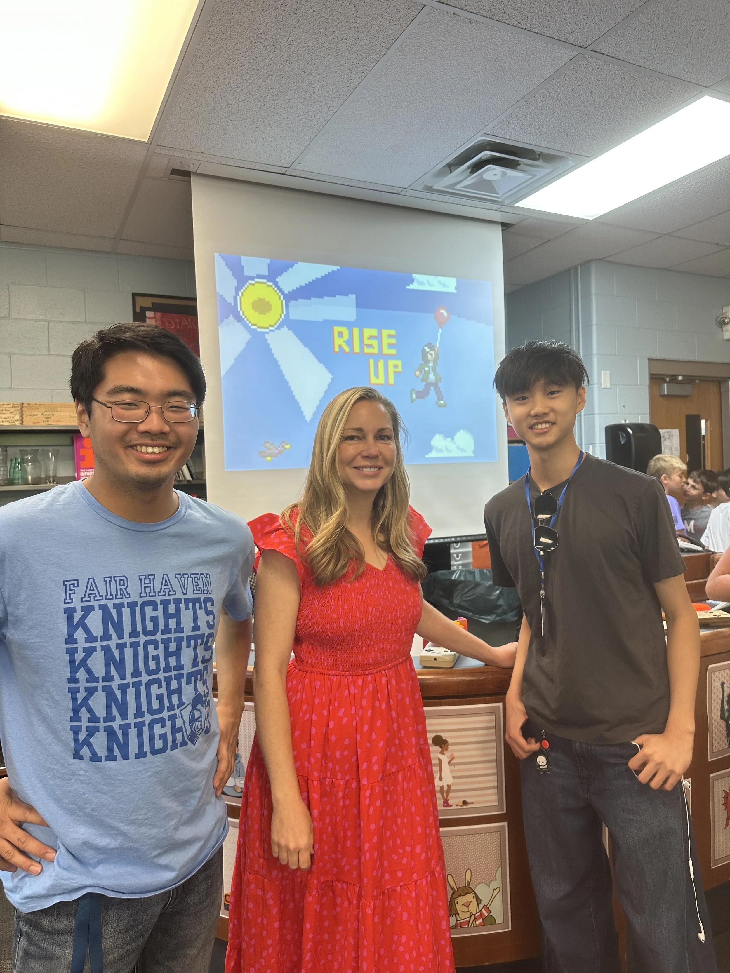 KNOLLWOOD-39-truman-teacher-posing-rise-up-slide.jpeg