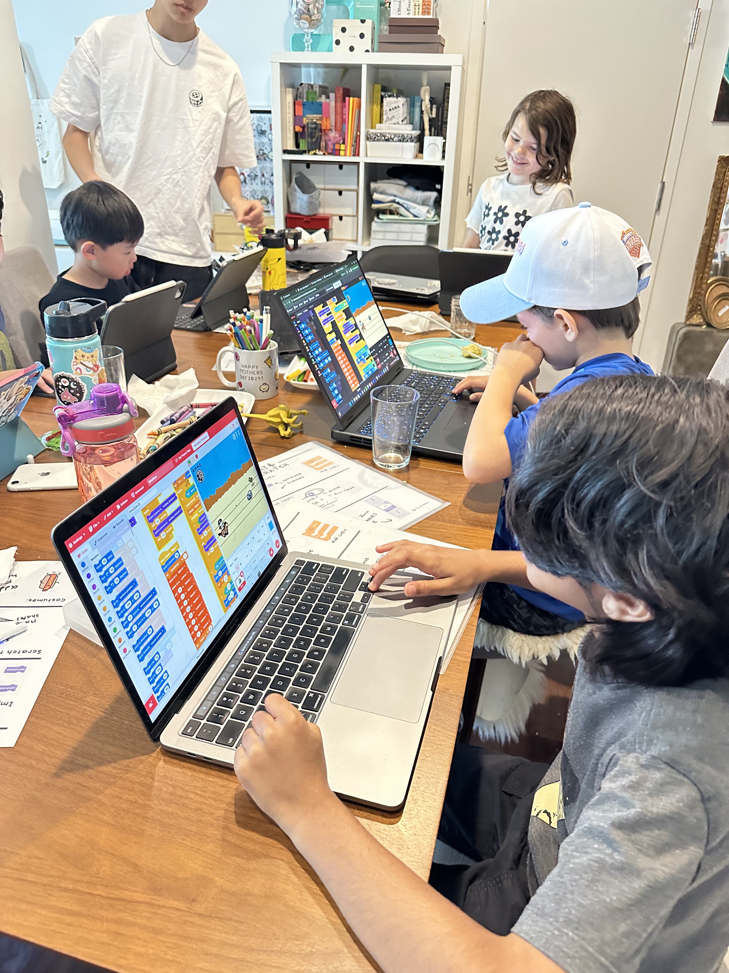 20-MP-Wshop1-day4-scratch-code-visible-on-tablet-kids-gathered-2026-age16.jpeg