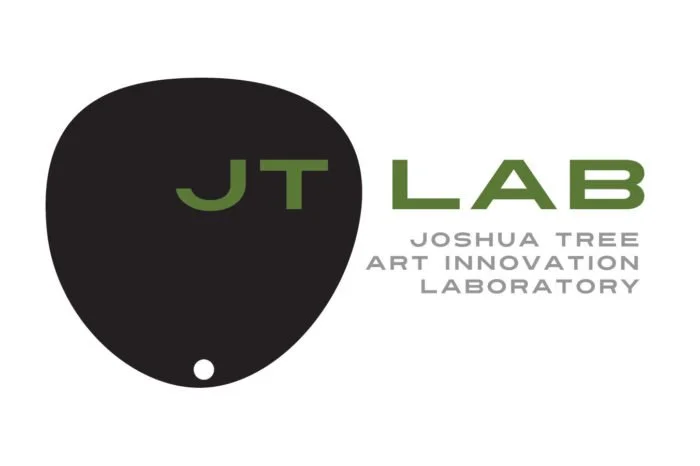 Logo for JT Lab, Joshua Tree Art Innovation Laboratory, featuring a black balloon with green and gray text.
