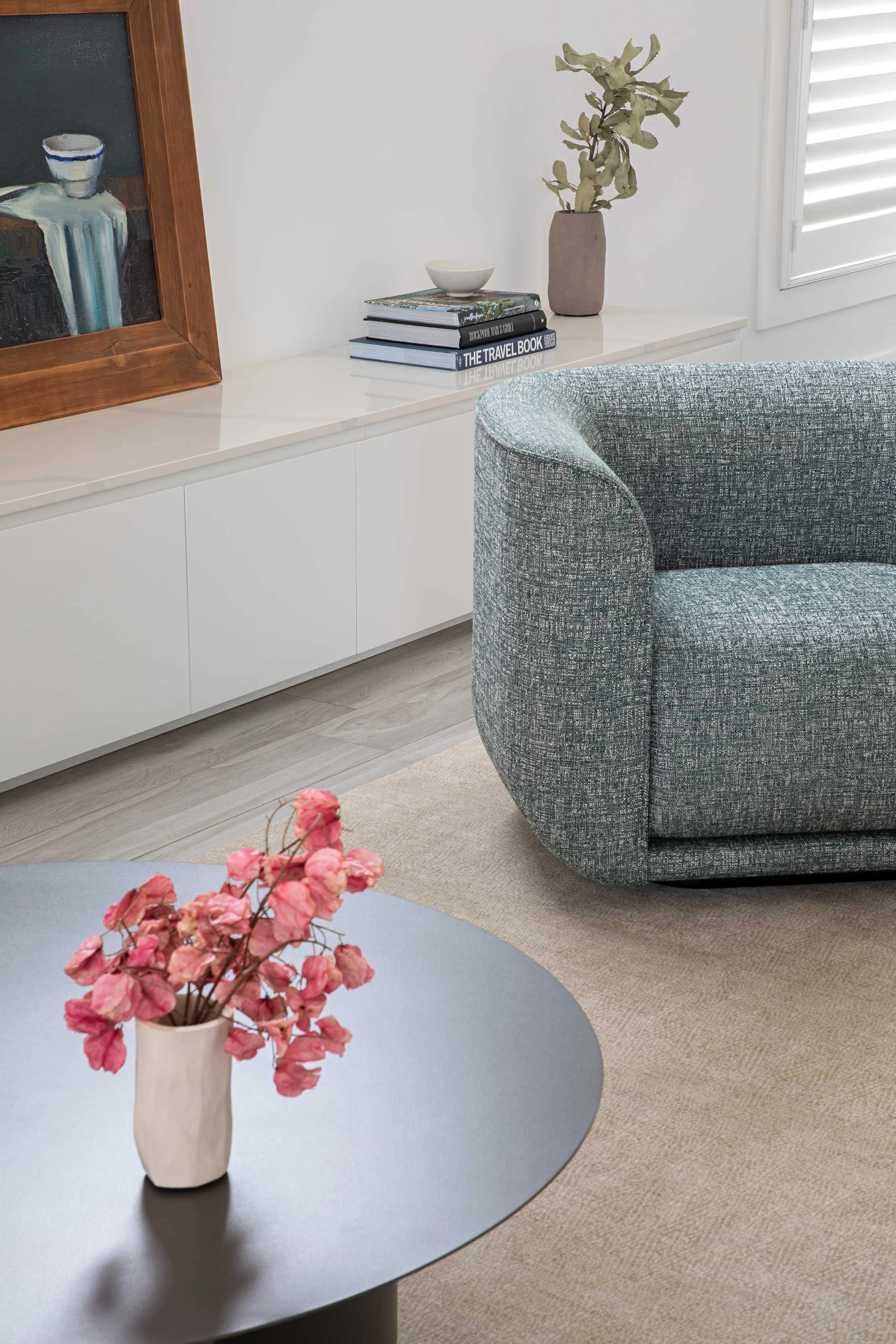 Sydney living room design modern chair round modern coffee table sideboard vase