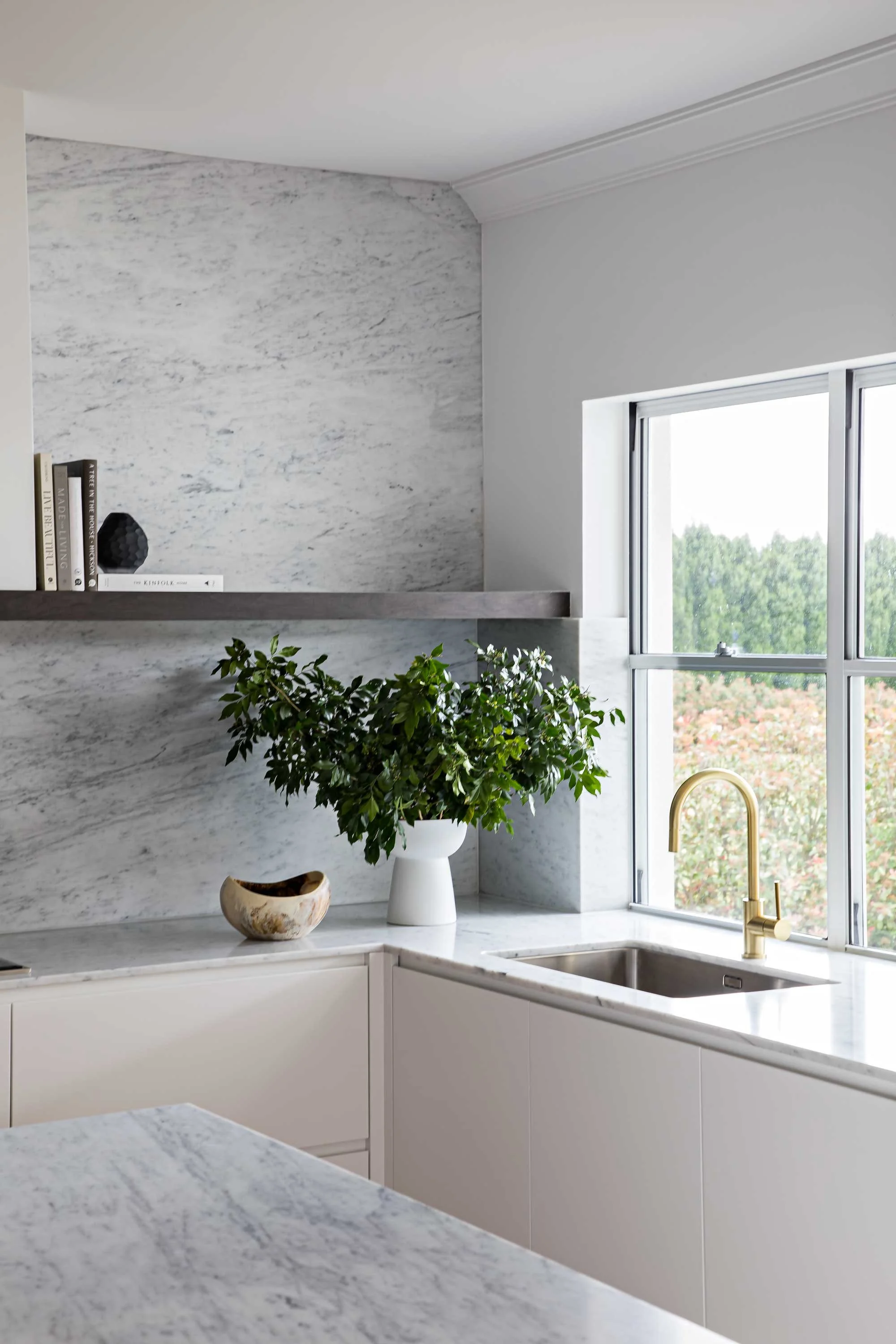 Kitchen design window sink island wall shelf vase flowers NSW South Coast