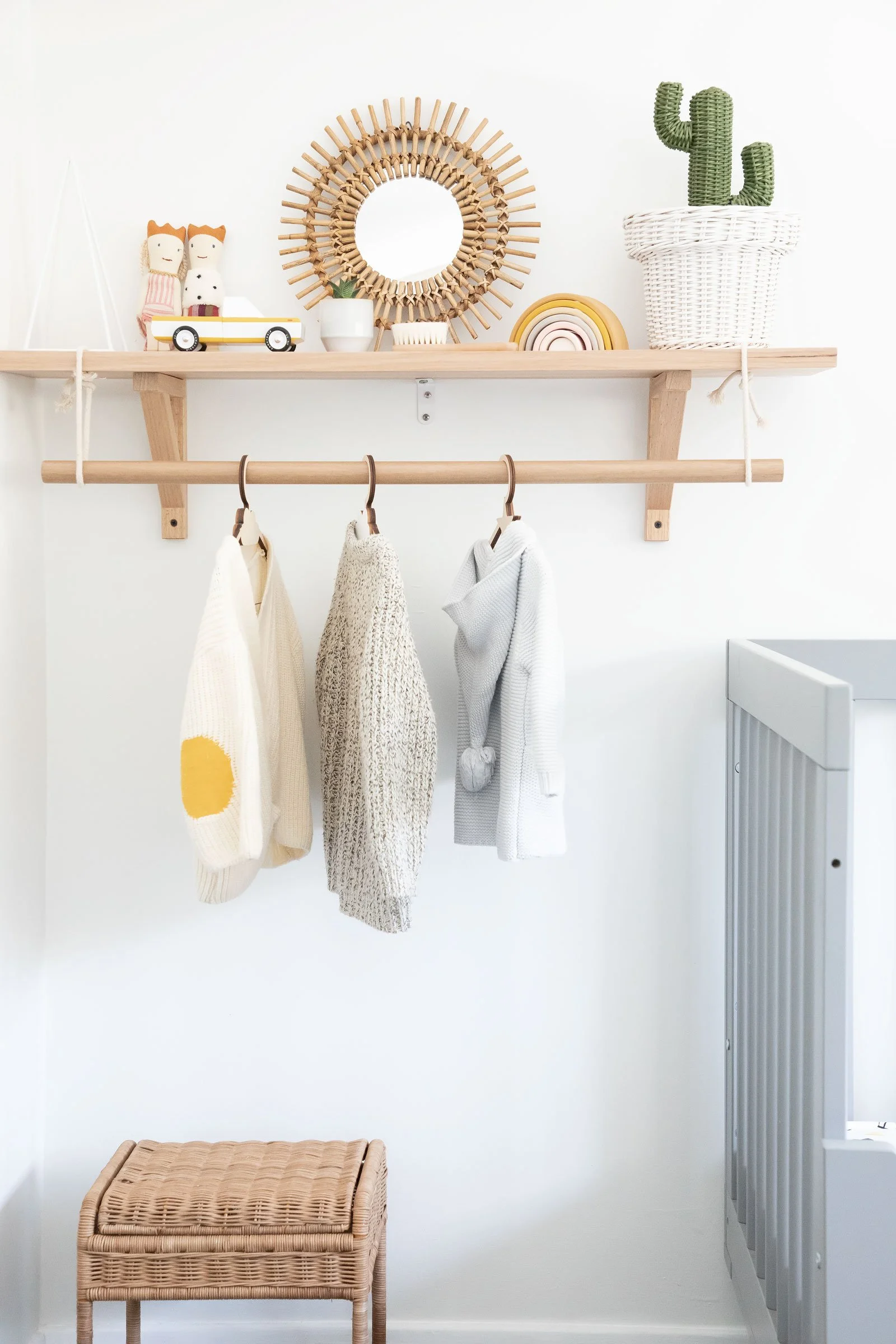 Eclectic children's bedroom clothes hanging space wooden cot NSW South Coast