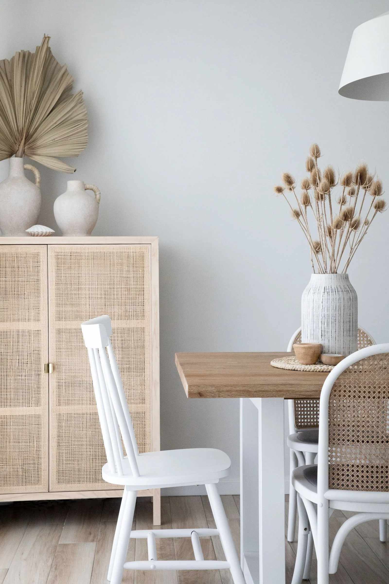 NSW South Coast Dining Space eclectic table chairs side board cupboard vase