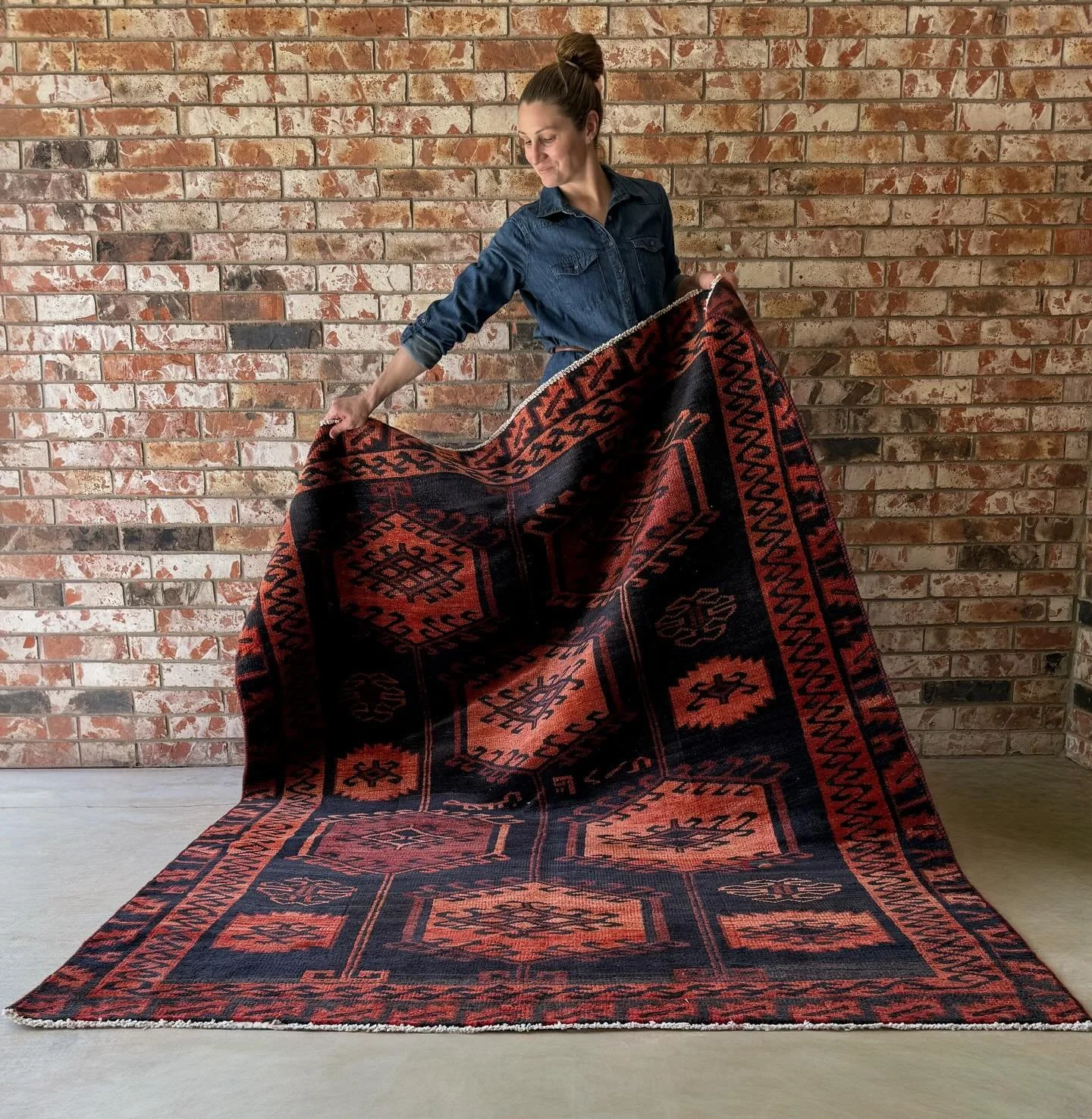 This is your sign to go a little moodier.
Deep tones, time-softened reds, and a pattern that does all the talking, Carmine Canyon anchors the room without closing it in.

Carmine Canyon | 5&rsquo;6 x 7&rsquo;2 | No. 1749

@TheRugLadies | rugladies.co