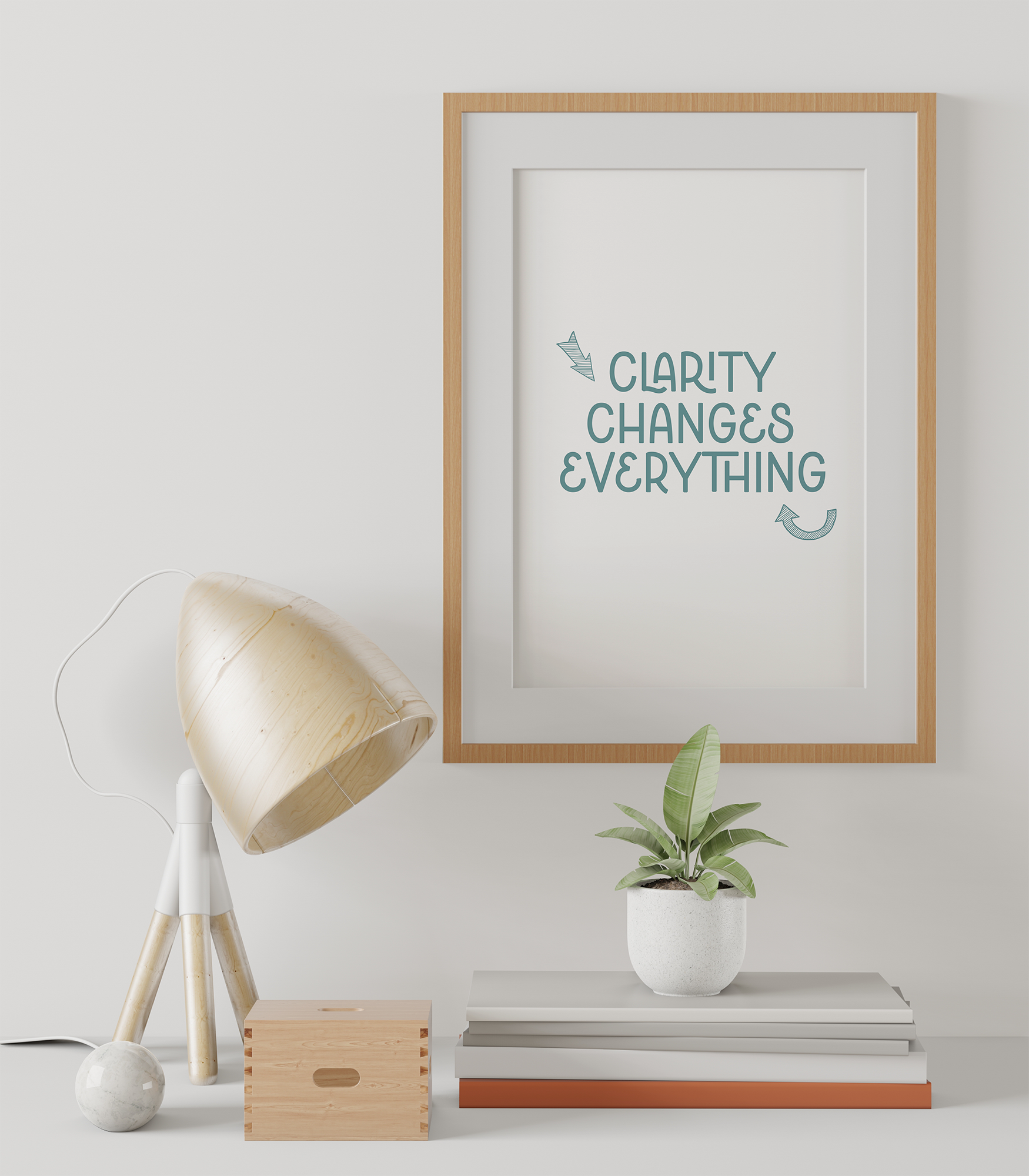 Decorative interior scene with a white framed board displaying the quote 'Clarity Changes Everything' with arrows, a potted plant, a modern wooden floor lamp, a wooden crate, and a stack of books or boxes against a white wall.
