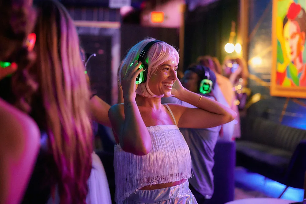 Silent disco party with wireless headsets