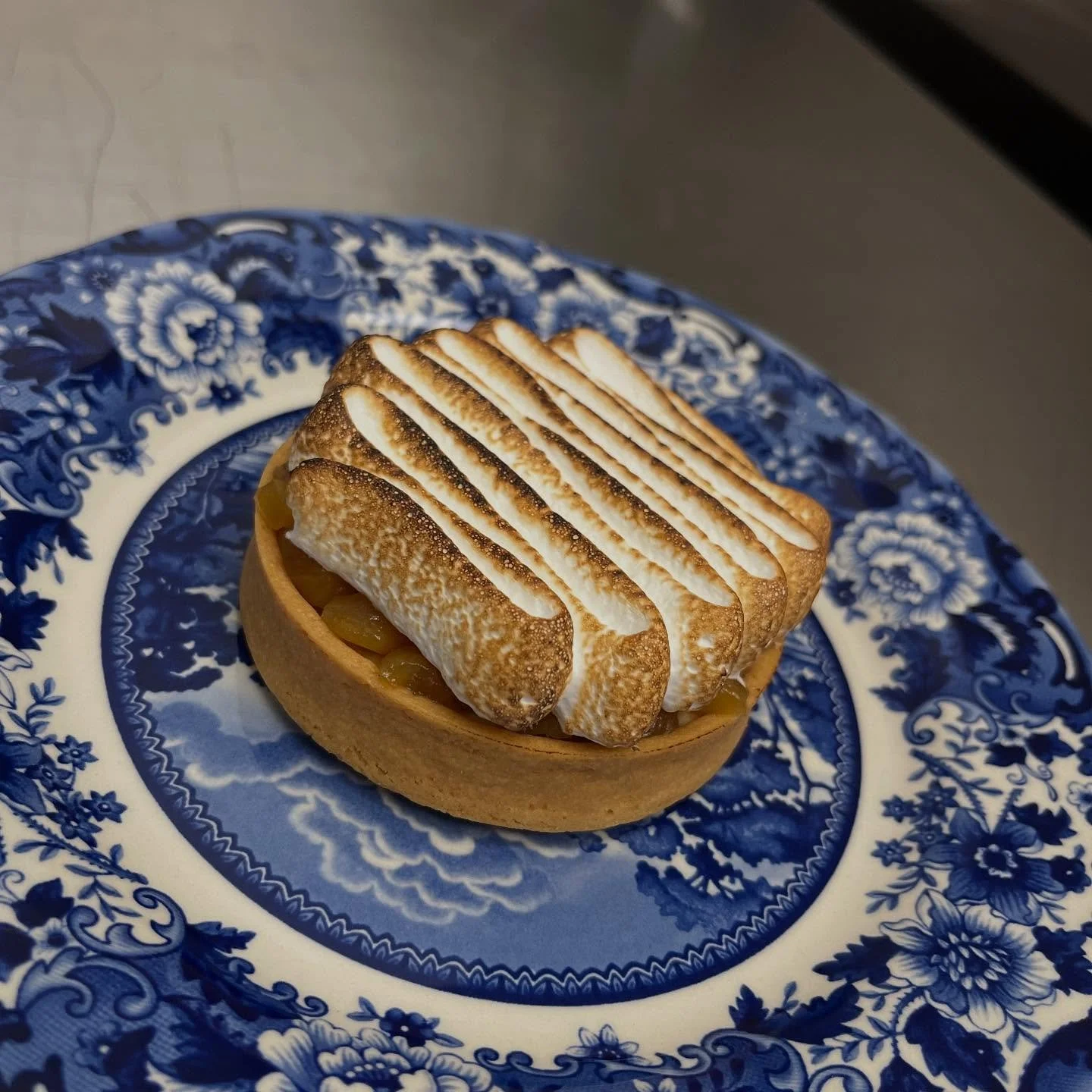 My Pi&ntilde;a Colada Tart
Rum Bavarian Cream
Dark Rum Caramelized Pineapple
Coconut Swiss Meringue 
Kiss with torch,