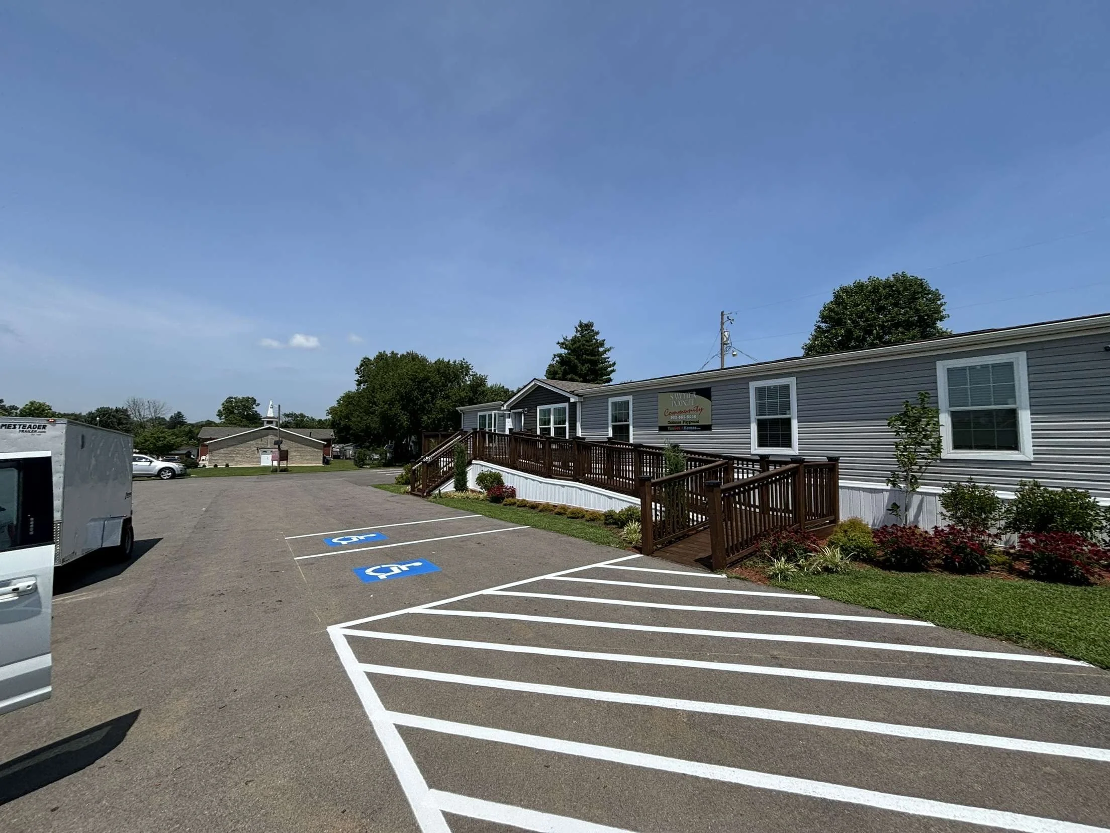 Parking lot with Finished Line striping work and custom lines