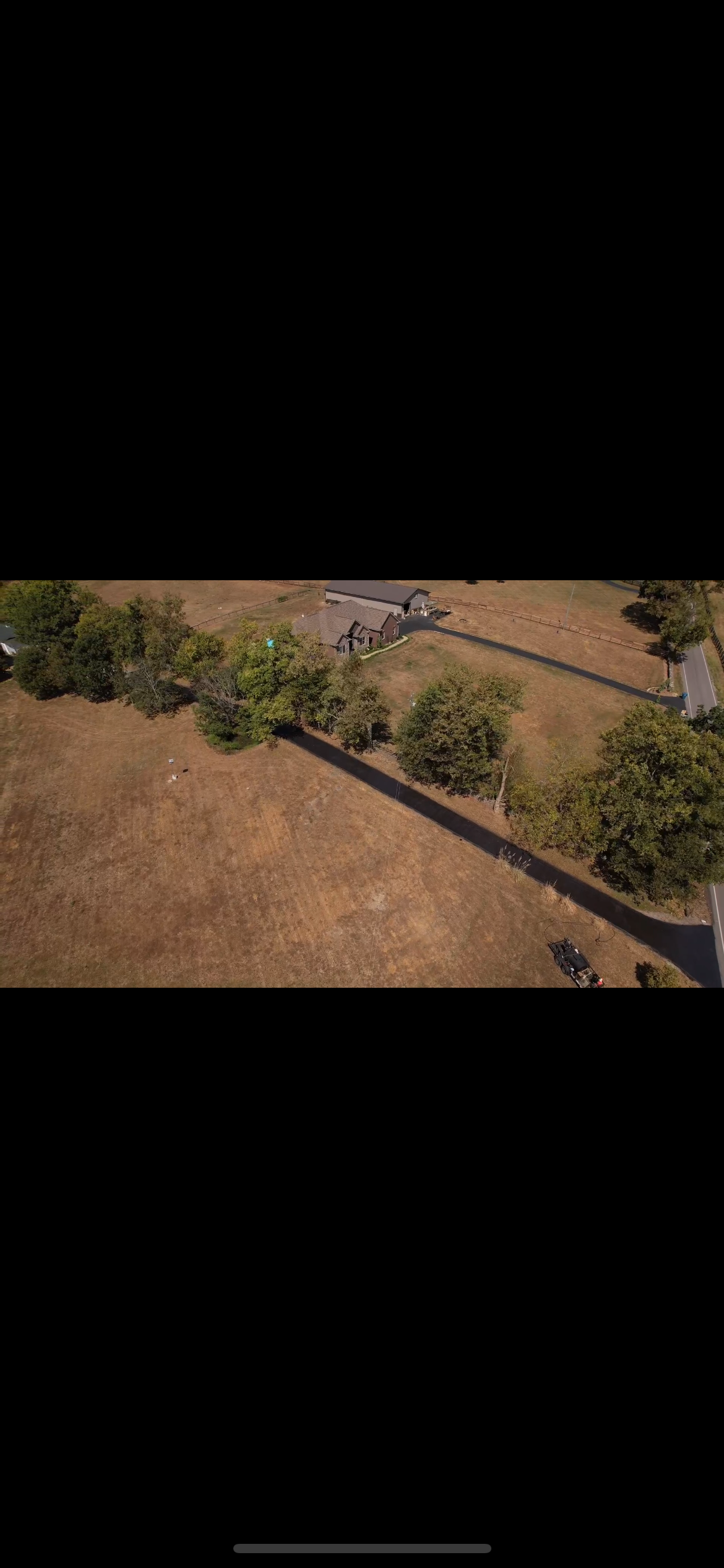 Drone view of Finished Farm House being sealcoated 