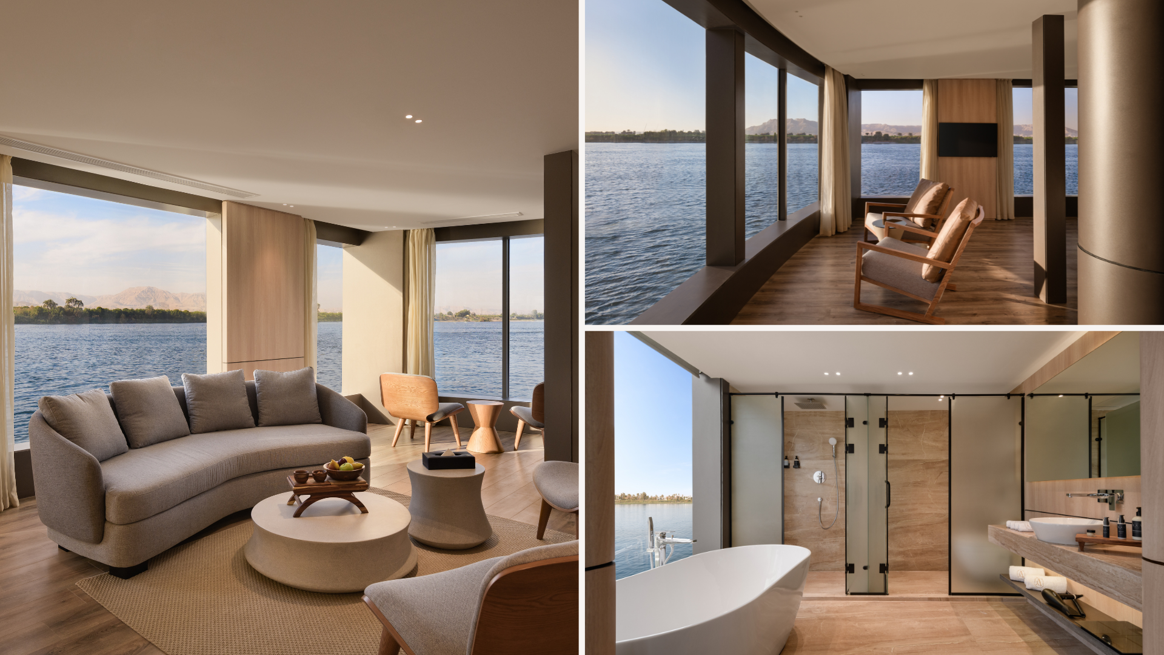 A luxurious waterfront suite with a living room, a sitting area with two chairs, and a modern bathroom featuring a bathtub and walk-in shower, all with large windows overlooking a river.