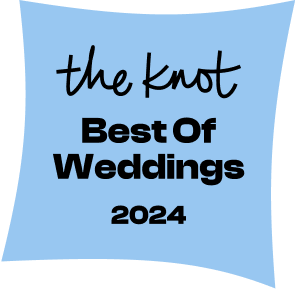 A blue flag with black and white text that reads 'the knot Best Of Weddings 2024'.
