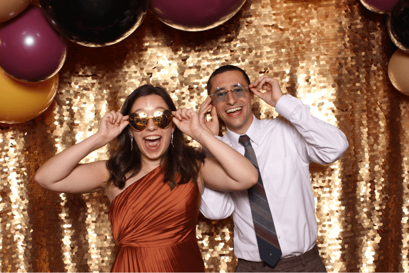 fun-couple-sequin-backdrop.png