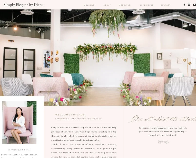A wedding or event venue decorated with greenery and hanging plants, featuring pastel-colored chairs and floral arrangements on the floor.