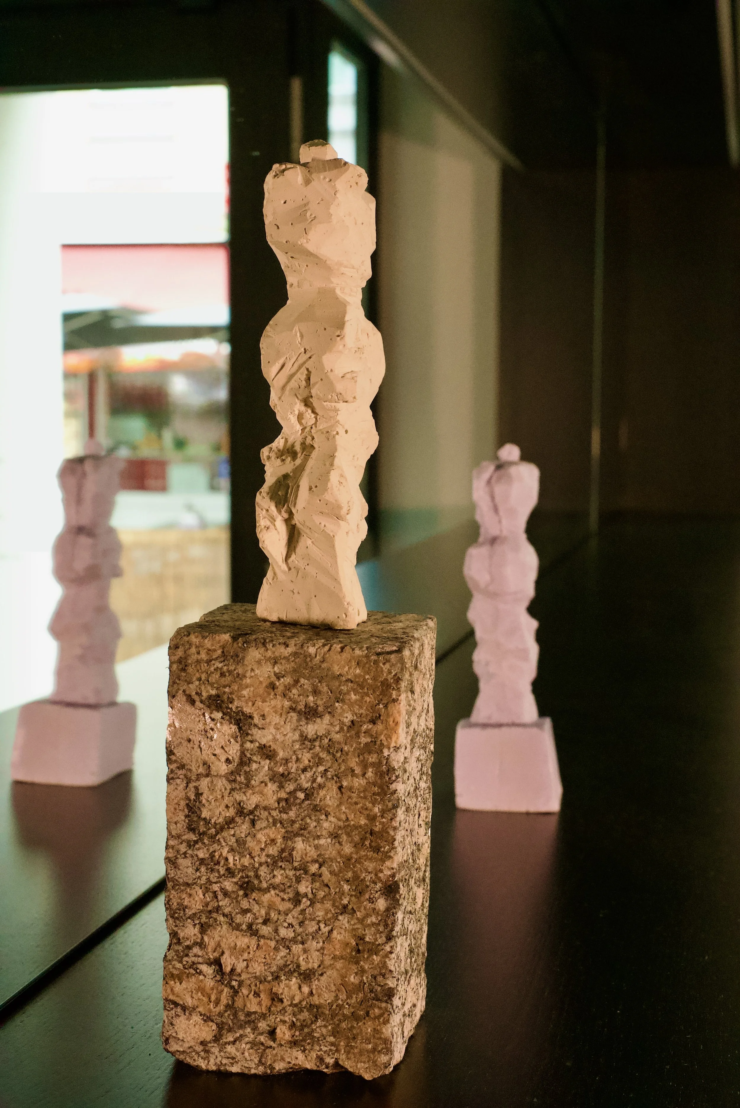 Front: River, plaster & stone, 2026, Back: River, soap, 2026