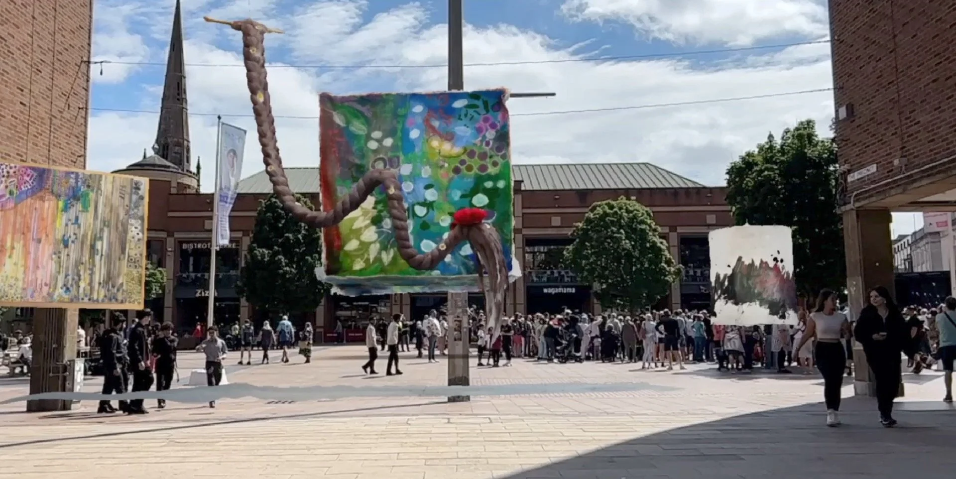 This image shows a visualisation of how the Augmented Reality exhibition appears, with artworks seemingly floating in space