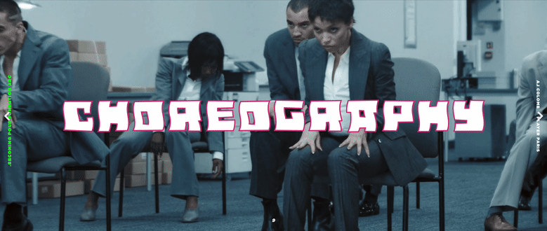 People sitting in chairs in an office, with a prominent text overlay that reads 'CHOREOGRAPHY' in bold, colorful letters.